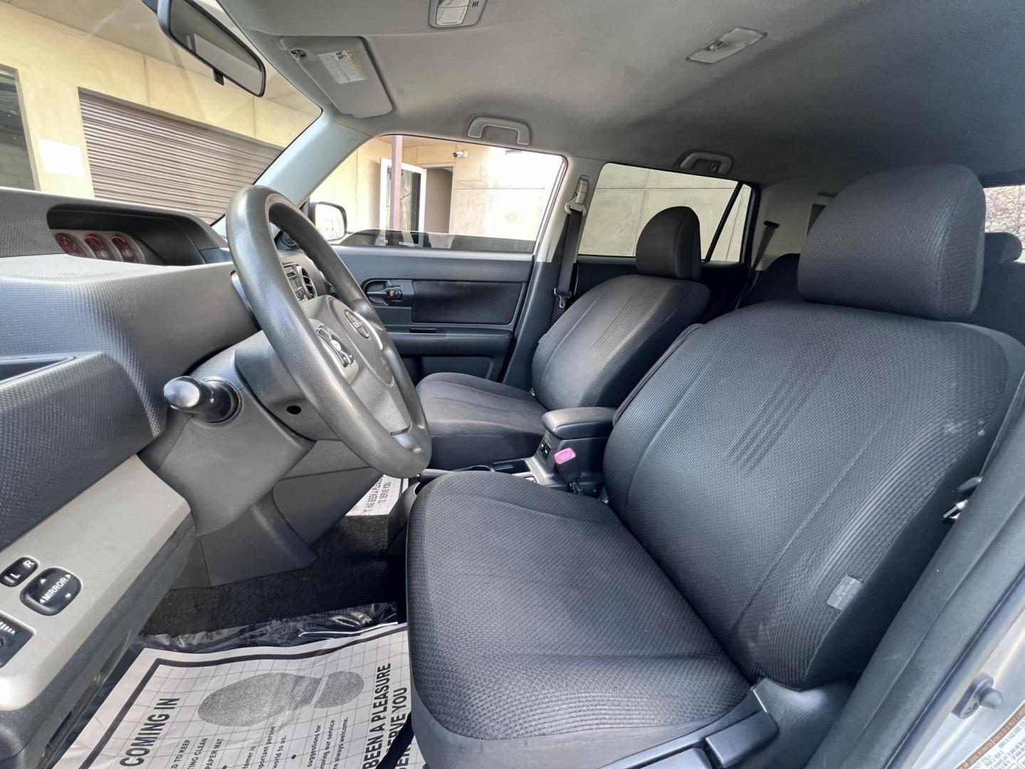 2008 Silver Scion xB Wagon (JTLKE50EX81) with an 2.4L L4 DOHC 16V engine, AUTOMATIC transmission, located at 30 S. Berkeley Avenue, Pasadena, CA, 91107, (626) 248-7567, 34.145447, -118.109398 - 2008 Scion xB Wagon – Bold Looks, Toyota Reliability, and Affordable Payments – Buy Here Pay Here in Pasadena If you’ve been searching for a dependable, fuel-efficient, and versatile hatchback with unmistakable style, this 2008 Scion xB is the perfect fit — available now at Crown City Mot - Photo#9