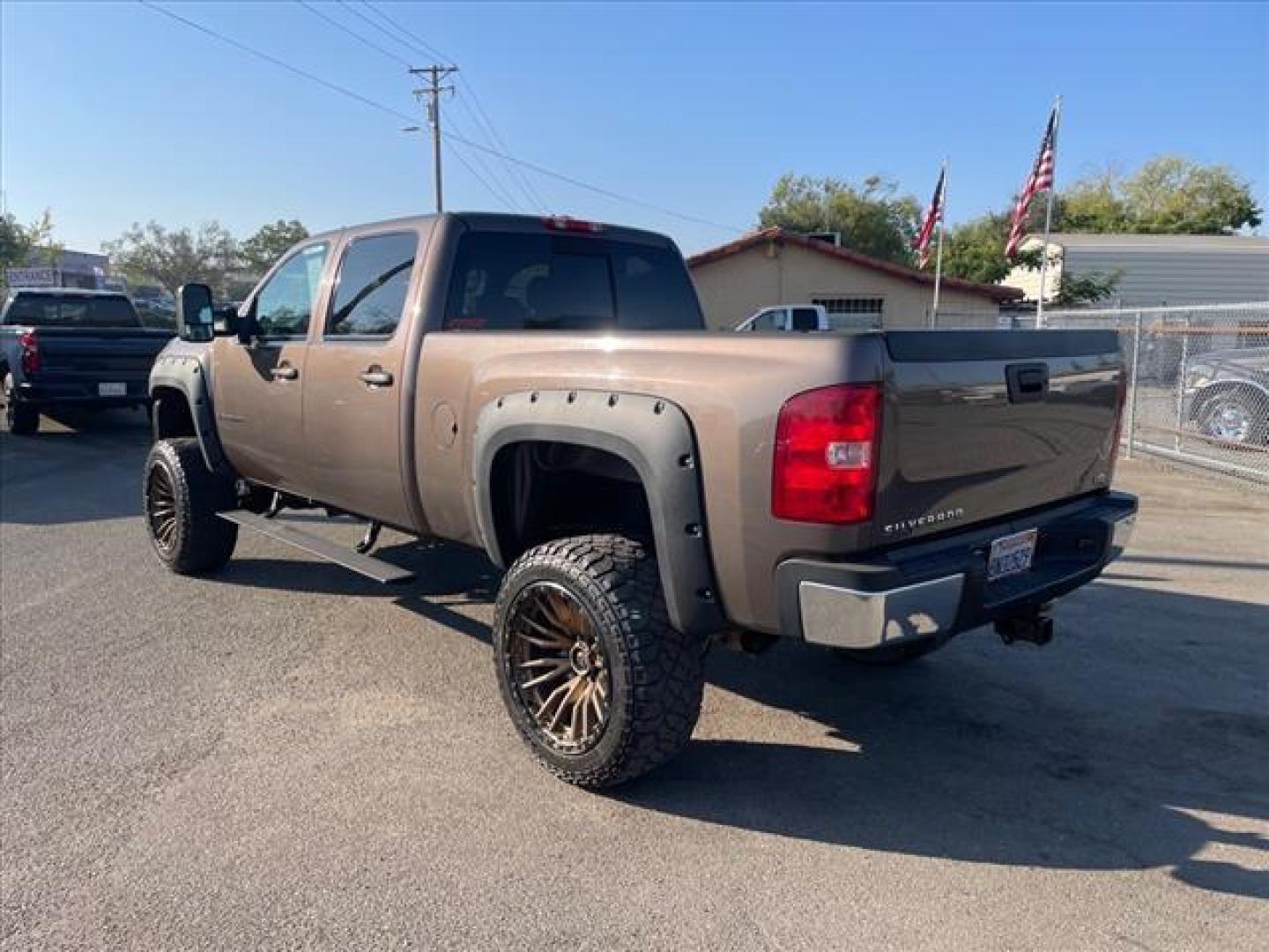 2008 Desert Brown Metallic Chevrolet Silverado 2500HD LTZ (1GCHK236X8F) with an 6.6L Duramax 6.6L Diesel Turbo V8 365hp 660ft. lbs. Common Rail Direct Injection engine, Allison 1000 6-Speed Shiftable Automatic transmission, located at 800 Riverside Ave, Roseville, CA, 95678, 916-773-4549 & Toll Free: 866-719-4393, 38.732265, -121.291039 - DURAMAX DIESEL CREW CAB 4X4 LTZ LIFTED CUSTOM WHEELS ALLISON TRANSMISSION - Photo#2