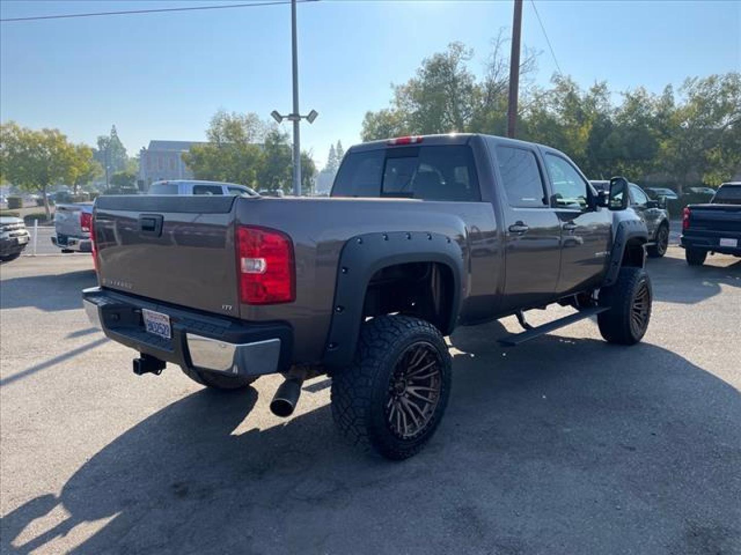 2008 Desert Brown Metallic Chevrolet Silverado 2500HD LTZ (1GCHK236X8F) with an 6.6L Duramax 6.6L Diesel Turbo V8 365hp 660ft. lbs. Common Rail Direct Injection engine, Allison 1000 6-Speed Shiftable Automatic transmission, located at 800 Riverside Ave, Roseville, CA, 95678, 916-773-4549 & Toll Free: 866-719-4393, 38.732265, -121.291039 - DURAMAX DIESEL CREW CAB 4X4 LTZ LIFTED CUSTOM WHEELS ALLISON TRANSMISSION - Photo#3