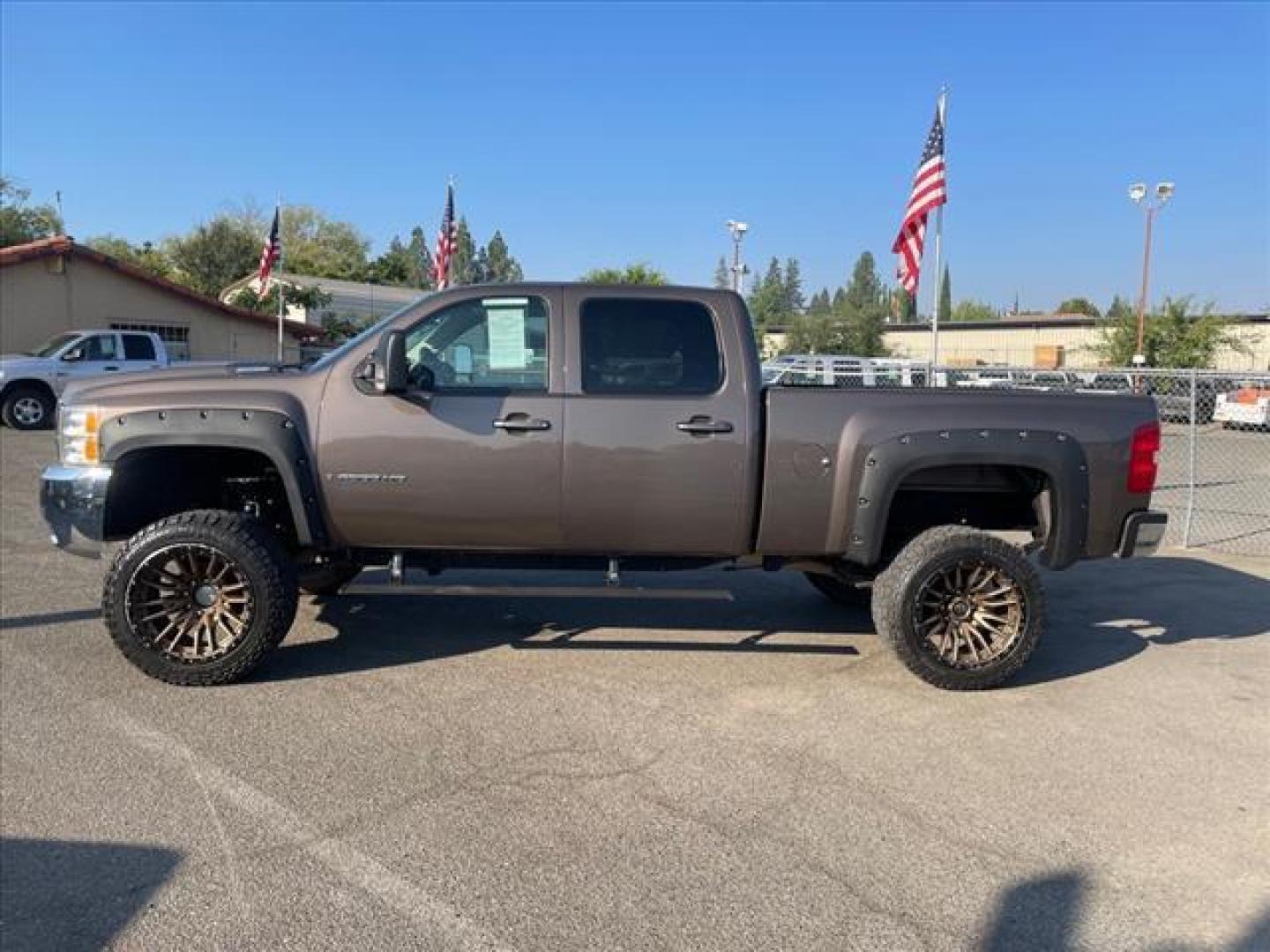 2008 Desert Brown Metallic Chevrolet Silverado 2500HD LTZ (1GCHK236X8F) with an 6.6L Duramax 6.6L Diesel Turbo V8 365hp 660ft. lbs. Common Rail Direct Injection engine, Allison 1000 6-Speed Shiftable Automatic transmission, located at 800 Riverside Ave, Roseville, CA, 95678, 916-773-4549 & Toll Free: 866-719-4393, 38.732265, -121.291039 - DURAMAX DIESEL CREW CAB 4X4 LTZ LIFTED CUSTOM WHEELS ALLISON TRANSMISSION - Photo#4