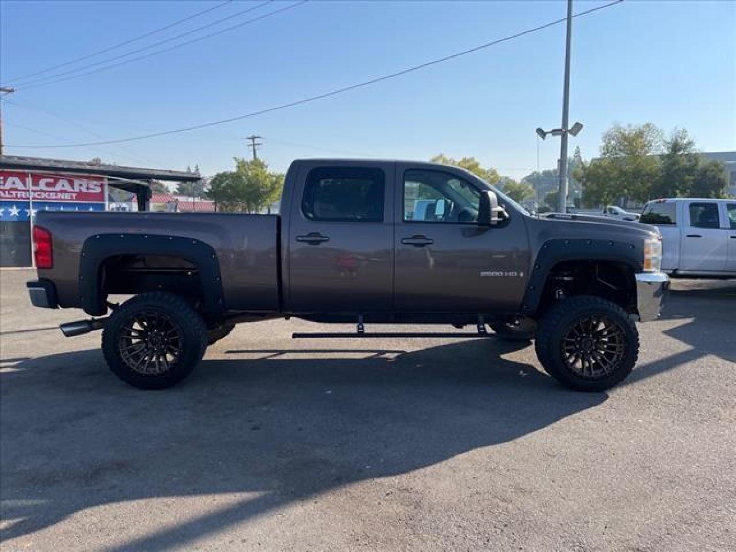 2008 Desert Brown Metallic Chevrolet Silverado 2500HD LTZ (1GCHK236X8F) with an 6.6L Duramax 6.6L Diesel Turbo V8 365hp 660ft. lbs. Common Rail Direct Injection engine, Allison 1000 6-Speed Shiftable Automatic transmission, located at 800 Riverside Ave, Roseville, CA, 95678, 916-773-4549 & Toll Free: 866-719-4393, 38.732265, -121.291039 - DURAMAX DIESEL CREW CAB 4X4 LTZ LIFTED CUSTOM WHEELS ALLISON TRANSMISSION - Photo#6