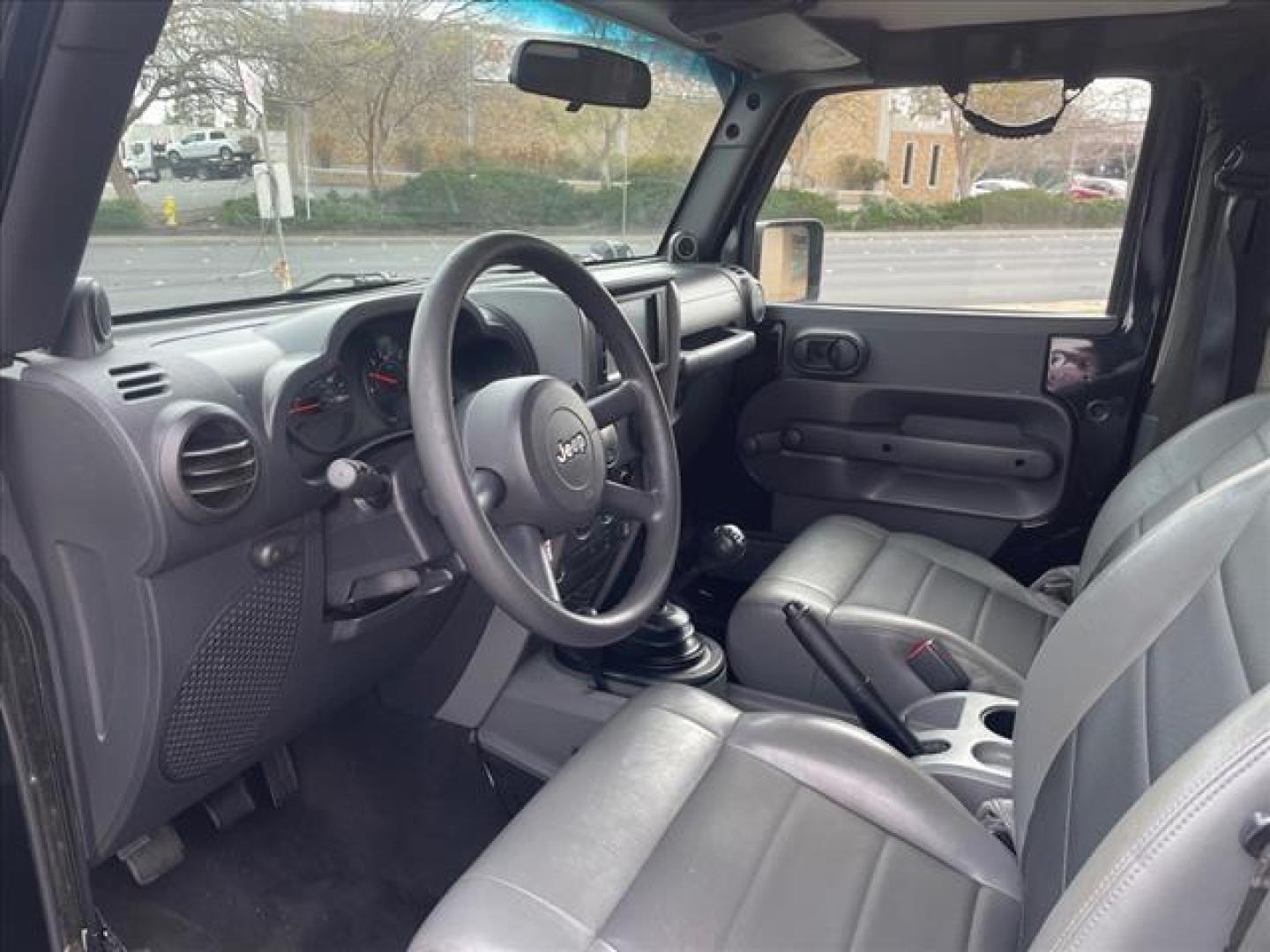2009 Black Clear Coat Jeep Wrangler X (1J4FA24149L) with an 3.8L 3.8L V6 202hp 237ft. lbs. Sequential Multiport Fuel Injection engine, 6-Speed Manual transmission, located at 800 Riverside Ave, Roseville, CA, 95678, 916-773-4549 & Toll Free: 866-719-4393, 38.732265, -121.291039 - 4X4 LOW MILES 6 SPEED MANUAL NEW TIRES CLEAN CARFAX - Photo#10