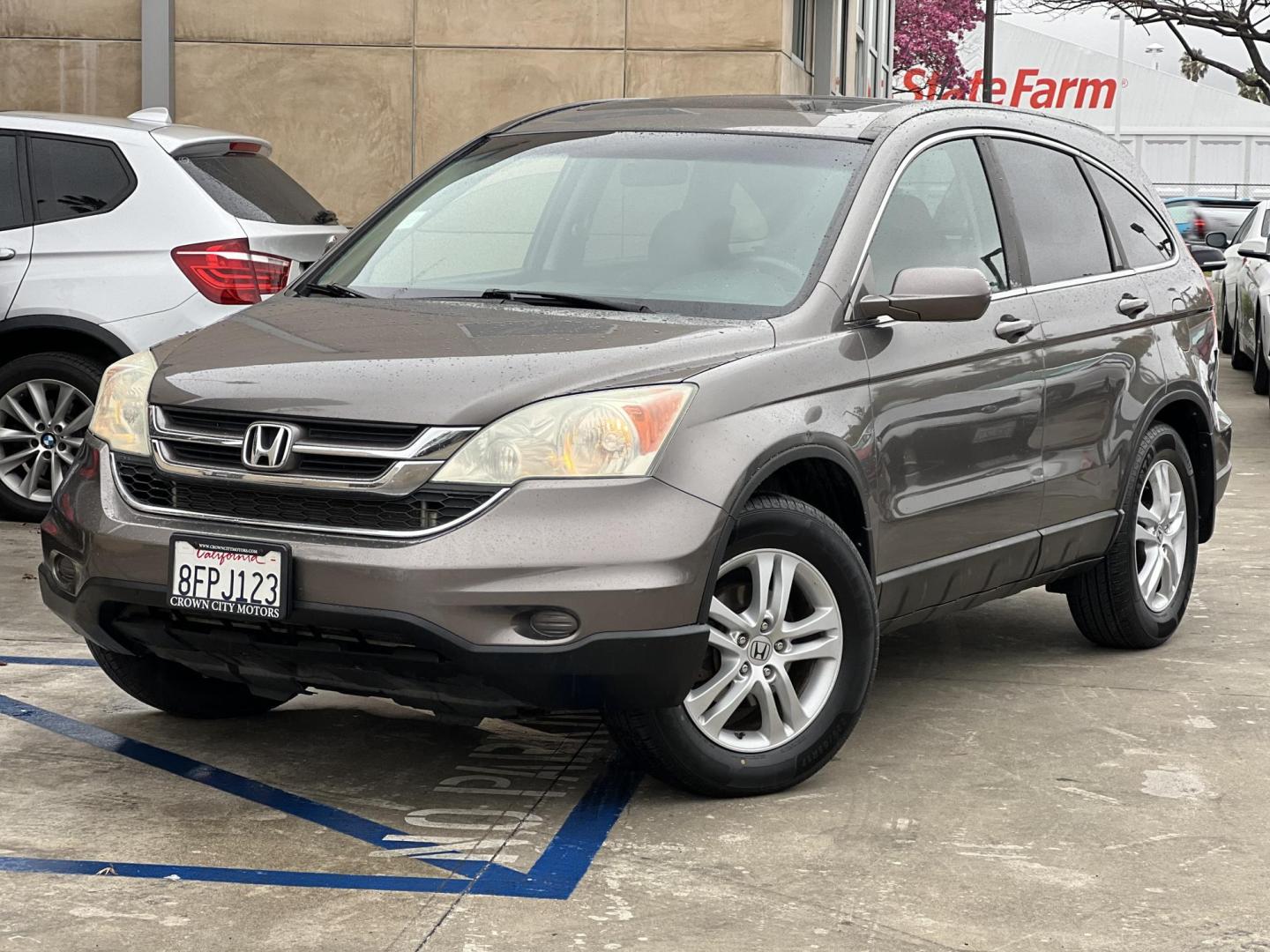2010 Gray /BROWN Honda CR-V EX-L 4WD 5-Speed AT (5J6RE4H76AL) with an 2.4L L4 DOHC 16V engine, 5-Speed Automatic transmission, located at 30 S. Berkeley Avenue, Pasadena, CA, 91107, (626) 248-7567, 34.145447, -118.109398 - Moon Roof! New tires! Leather Seat! Drives and looks good! Bad credit? We can help! We are the bank. All our cars are thoroughly inspected and reconditioned by our technicians. FREE CARFAX report. Stop by or call to speak with our friendly staff. Whether you have bad credit, no credit, bankruptcy, - Photo#0