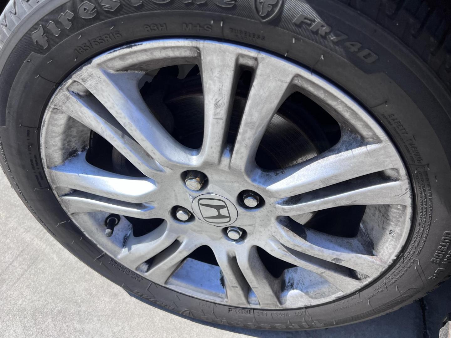 2010 Orange Revolution Metallic /Gray Honda Fit Sport 5-Speed AT (JHMGE8H48AC) with an 1.5L L4 SOHC 16V engine, 5-Speed Automatic transmission, located at 30 S. Berkeley Avenue, Pasadena, CA, 91107, (626) 248-7567, 34.145447, -118.109398 - 2010 Honda Fit for Sale at Crown City Motors - Pasadena, CA Looking for a reliable, fuel-efficient, and versatile compact car? Discover the 2010 Honda Fit, now available at Crown City Motors, located at 30 S Berkeley Ave, Pasadena, CA 91107. This vibrant subcompact hatchback, renowned for its pract - Photo#10