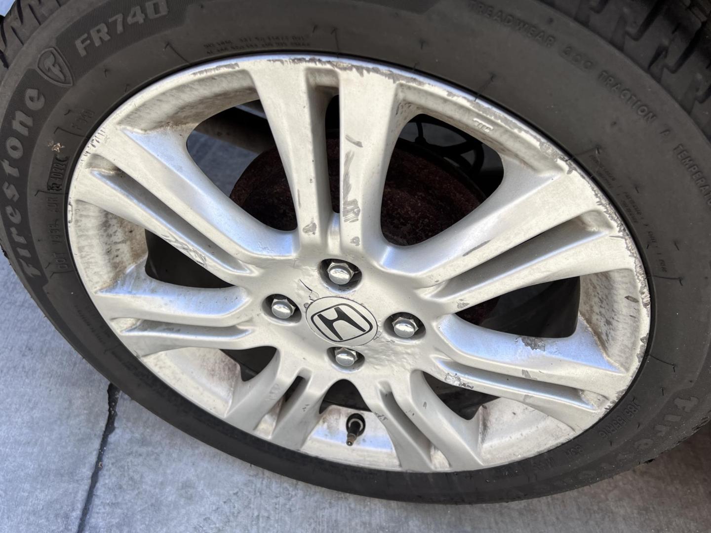 2010 Orange Revolution Metallic /Gray Honda Fit Sport 5-Speed AT (JHMGE8H48AC) with an 1.5L L4 SOHC 16V engine, 5-Speed Automatic transmission, located at 30 S. Berkeley Avenue, Pasadena, CA, 91107, (626) 248-7567, 34.145447, -118.109398 - 2010 Honda Fit for Sale at Crown City Motors - Pasadena, CA Looking for a reliable, fuel-efficient, and versatile compact car? Discover the 2010 Honda Fit, now available at Crown City Motors, located at 30 S Berkeley Ave, Pasadena, CA 91107. This vibrant subcompact hatchback, renowned for its pract - Photo#11