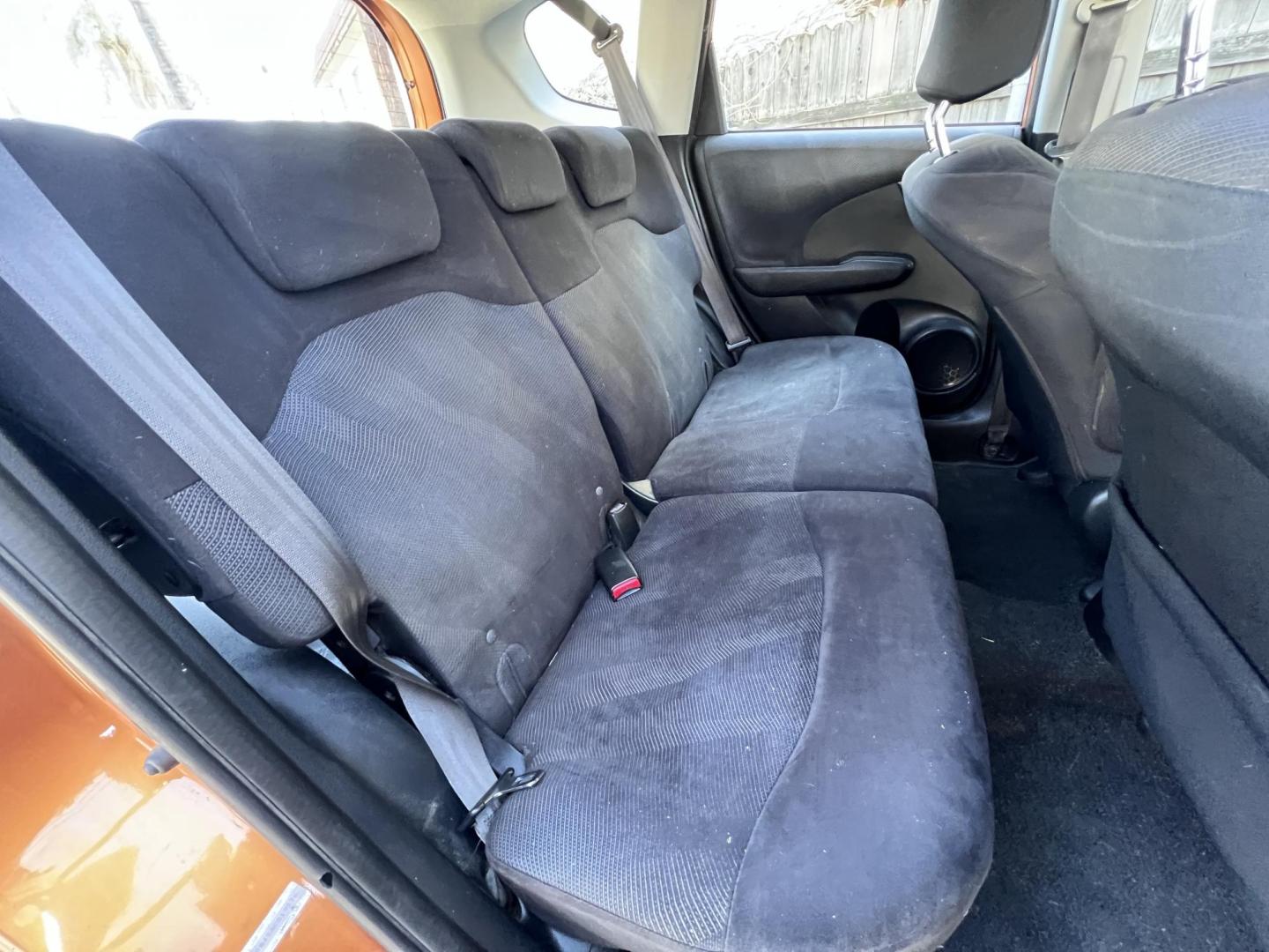 2010 Orange Revolution Metallic /Gray Honda Fit Sport 5-Speed AT (JHMGE8H48AC) with an 1.5L L4 SOHC 16V engine, 5-Speed Automatic transmission, located at 30 S. Berkeley Avenue, Pasadena, CA, 91107, (626) 248-7567, 34.145447, -118.109398 - 2010 Honda Fit for Sale at Crown City Motors - Pasadena, CA Looking for a reliable, fuel-efficient, and versatile compact car? Discover the 2010 Honda Fit, now available at Crown City Motors, located at 30 S Berkeley Ave, Pasadena, CA 91107. This vibrant subcompact hatchback, renowned for its pract - Photo#16