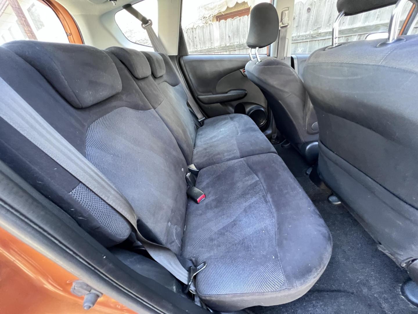 2010 Orange Revolution Metallic /Gray Honda Fit Sport 5-Speed AT (JHMGE8H48AC) with an 1.5L L4 SOHC 16V engine, 5-Speed Automatic transmission, located at 30 S. Berkeley Avenue, Pasadena, CA, 91107, (626) 248-7567, 34.145447, -118.109398 - 2010 Honda Fit for Sale at Crown City Motors - Pasadena, CA Looking for a reliable, fuel-efficient, and versatile compact car? Discover the 2010 Honda Fit, now available at Crown City Motors, located at 30 S Berkeley Ave, Pasadena, CA 91107. This vibrant subcompact hatchback, renowned for its pract - Photo#18