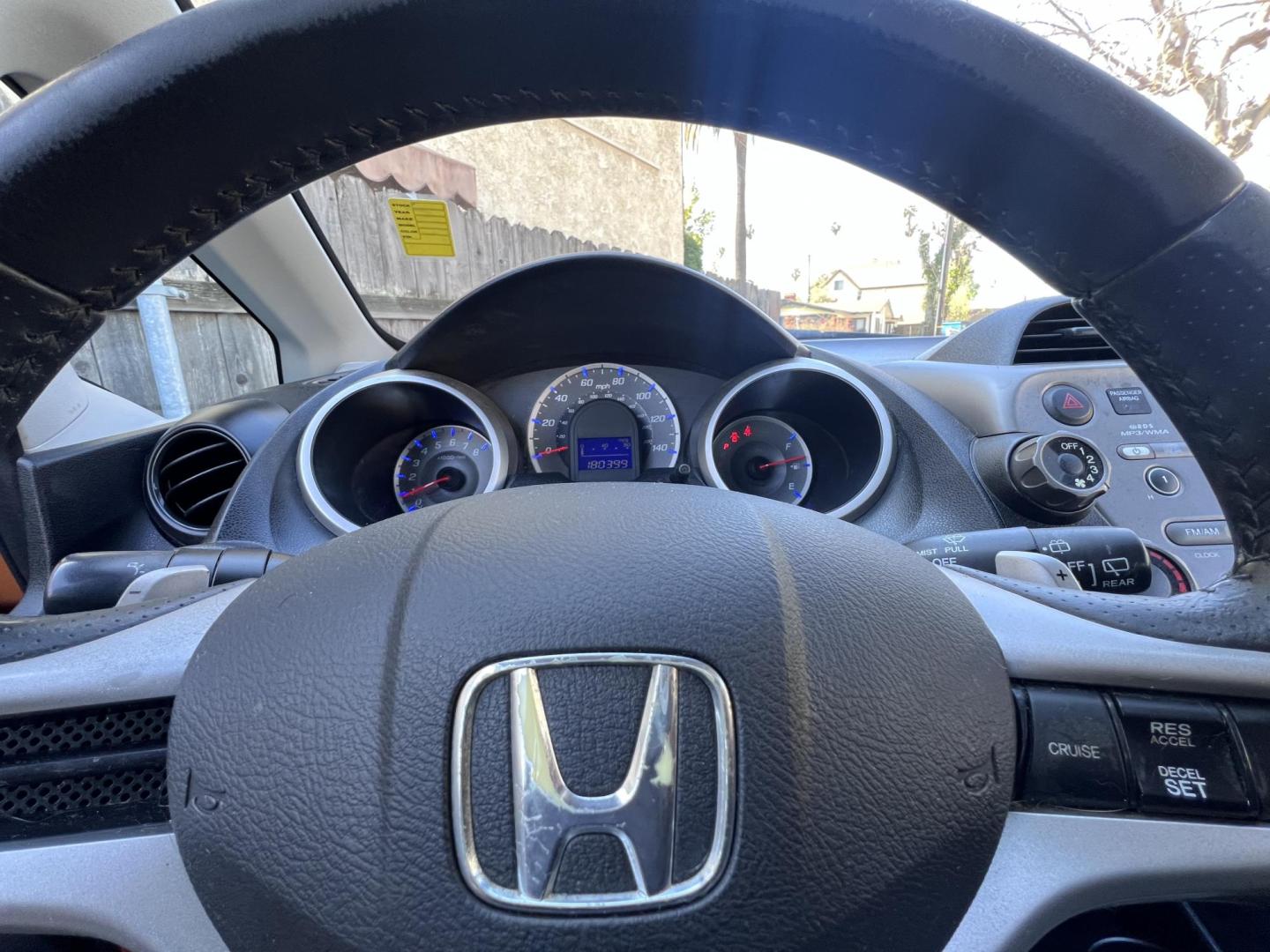 2010 Orange Revolution Metallic /Gray Honda Fit Sport 5-Speed AT (JHMGE8H48AC) with an 1.5L L4 SOHC 16V engine, 5-Speed Automatic transmission, located at 30 S. Berkeley Avenue, Pasadena, CA, 91107, (626) 248-7567, 34.145447, -118.109398 - 2010 Honda Fit for Sale at Crown City Motors - Pasadena, CA Looking for a reliable, fuel-efficient, and versatile compact car? Discover the 2010 Honda Fit, now available at Crown City Motors, located at 30 S Berkeley Ave, Pasadena, CA 91107. This vibrant subcompact hatchback, renowned for its pract - Photo#24