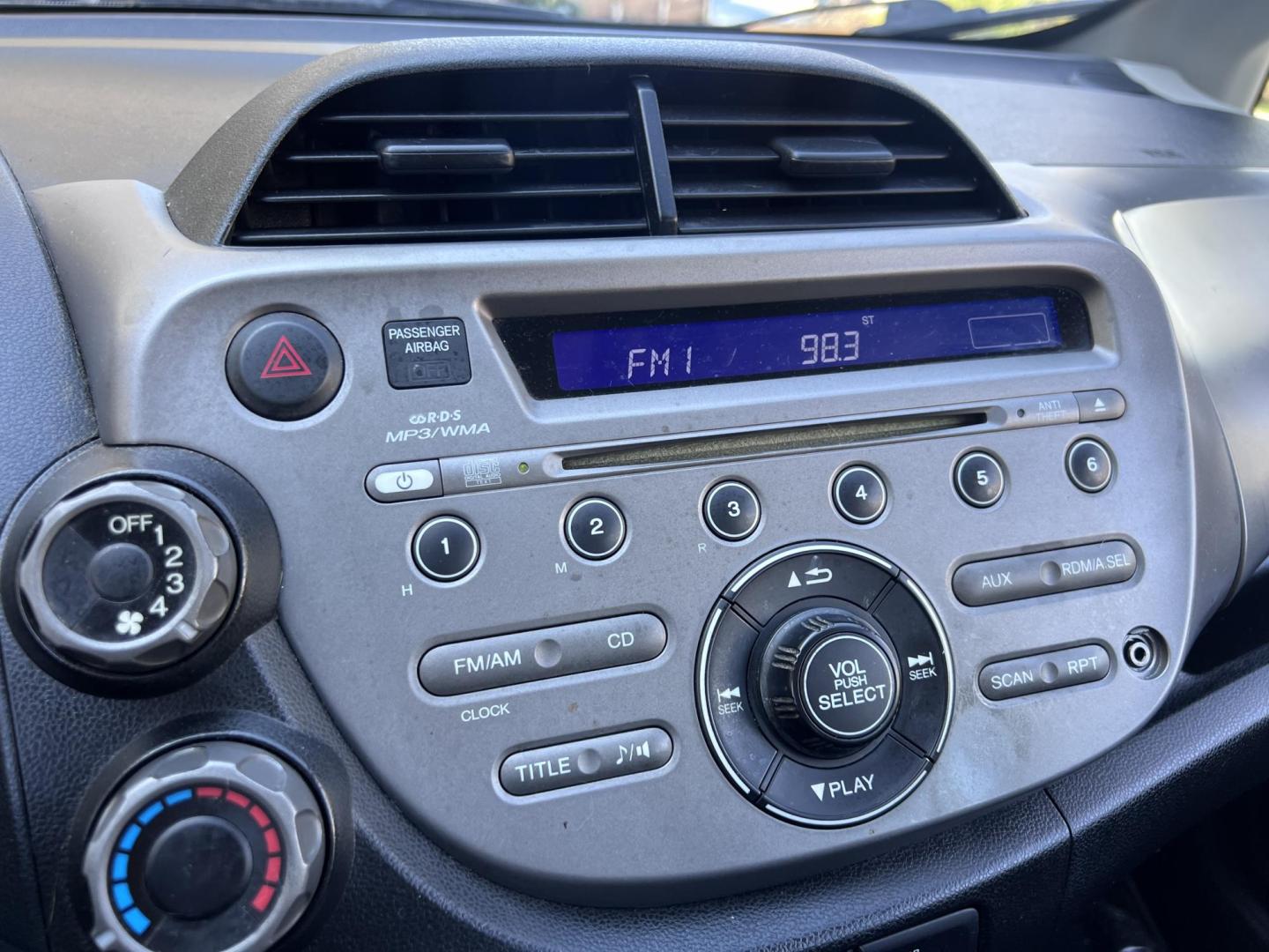 2010 Orange Revolution Metallic /Gray Honda Fit Sport 5-Speed AT (JHMGE8H48AC) with an 1.5L L4 SOHC 16V engine, 5-Speed Automatic transmission, located at 30 S. Berkeley Avenue, Pasadena, CA, 91107, (626) 248-7567, 34.145447, -118.109398 - 2010 Honda Fit for Sale at Crown City Motors - Pasadena, CA Looking for a reliable, fuel-efficient, and versatile compact car? Discover the 2010 Honda Fit, now available at Crown City Motors, located at 30 S Berkeley Ave, Pasadena, CA 91107. This vibrant subcompact hatchback, renowned for its pract - Photo#26