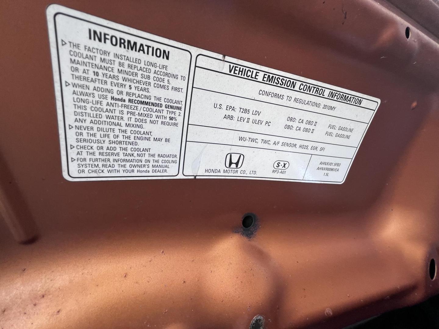 2010 Orange Revolution Metallic /Gray Honda Fit Sport 5-Speed AT (JHMGE8H48AC) with an 1.5L L4 SOHC 16V engine, 5-Speed Automatic transmission, located at 30 S. Berkeley Avenue, Pasadena, CA, 91107, (626) 248-7567, 34.145447, -118.109398 - 2010 Honda Fit for Sale at Crown City Motors - Pasadena, CA Looking for a reliable, fuel-efficient, and versatile compact car? Discover the 2010 Honda Fit, now available at Crown City Motors, located at 30 S Berkeley Ave, Pasadena, CA 91107. This vibrant subcompact hatchback, renowned for its pract - Photo#27
