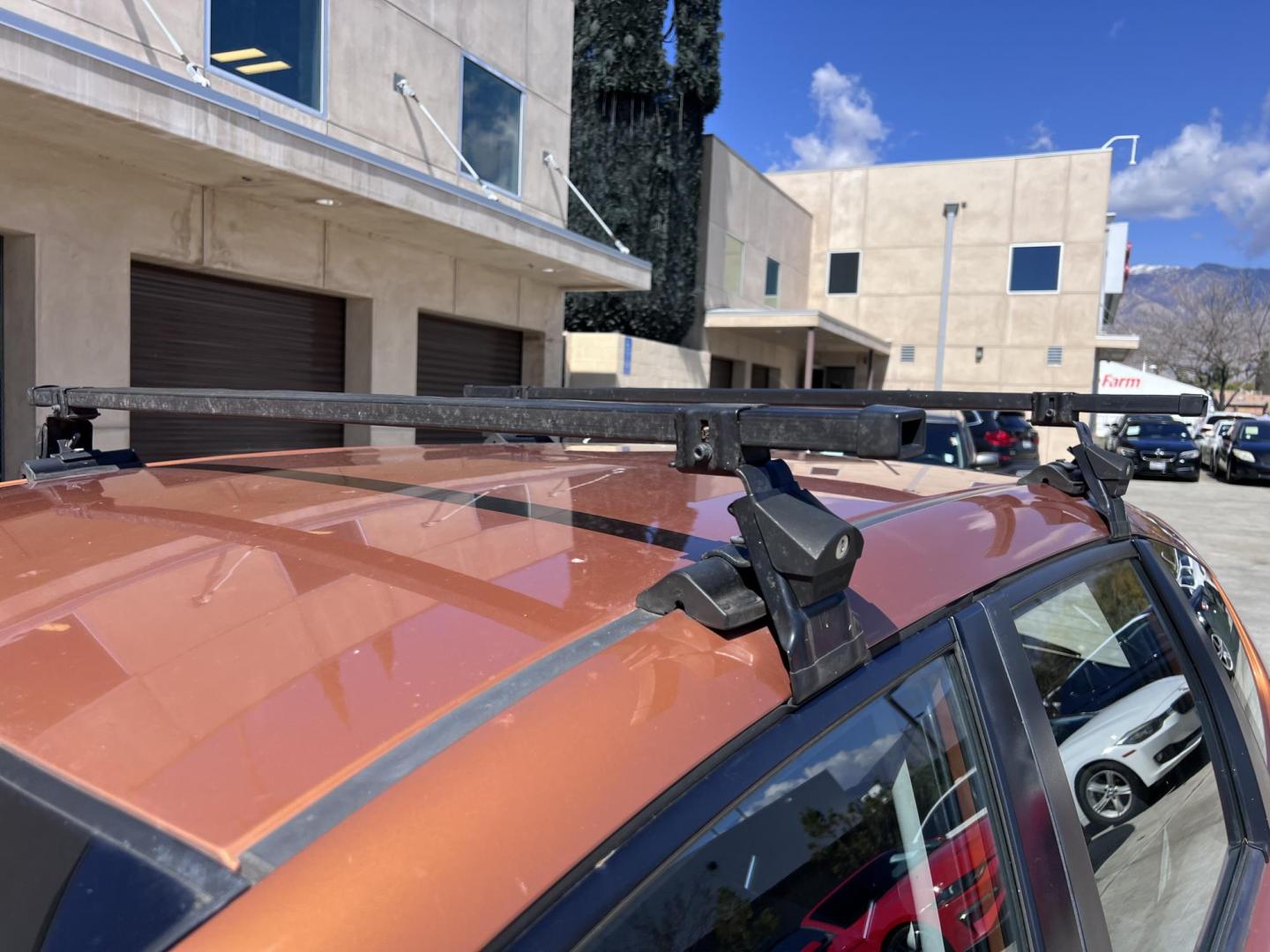 2010 Orange Revolution Metallic /Gray Honda Fit Sport 5-Speed AT (JHMGE8H48AC) with an 1.5L L4 SOHC 16V engine, 5-Speed Automatic transmission, located at 30 S. Berkeley Avenue, Pasadena, CA, 91107, (626) 248-7567, 34.145447, -118.109398 - 2010 Honda Fit for Sale at Crown City Motors - Pasadena, CA Looking for a reliable, fuel-efficient, and versatile compact car? Discover the 2010 Honda Fit, now available at Crown City Motors, located at 30 S Berkeley Ave, Pasadena, CA 91107. This vibrant subcompact hatchback, renowned for its pract - Photo#7