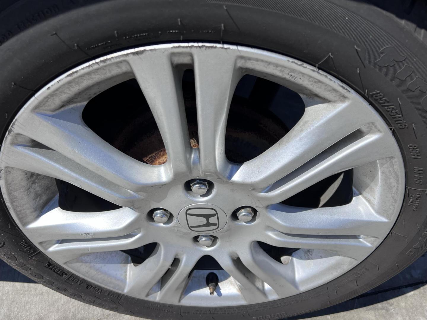 2010 Orange Revolution Metallic /Gray Honda Fit Sport 5-Speed AT (JHMGE8H48AC) with an 1.5L L4 SOHC 16V engine, 5-Speed Automatic transmission, located at 30 S. Berkeley Avenue, Pasadena, CA, 91107, (626) 248-7567, 34.145447, -118.109398 - 2010 Honda Fit for Sale at Crown City Motors - Pasadena, CA Looking for a reliable, fuel-efficient, and versatile compact car? Discover the 2010 Honda Fit, now available at Crown City Motors, located at 30 S Berkeley Ave, Pasadena, CA 91107. This vibrant subcompact hatchback, renowned for its pract - Photo#9