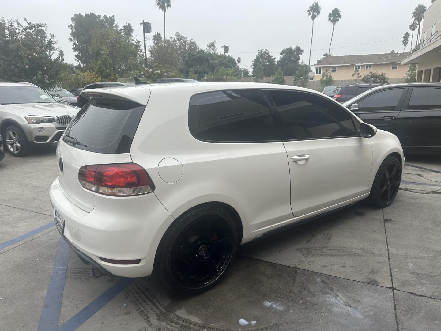 2010 White /Black Volkswagen GTI 2.0T Coupe PZEV (WVWFD7AJ9AW) with an 2.0L L4 DOHC 16V TURBO engine, Automatic transmission, located at 30 S. Berkeley Avenue, Pasadena, CA, 91107, (626) 248-7567, 34.145447, -118.109398 - Leather Seats! Moon-roof! This 2010 Volkswagen GTI 2.0T Coupe PZEV looks and drives well. This vehicle comes with a dealer 30 day / 1,000 Mile Warranty ( call us for details) and with Options up to 5 years / 100,000 Mile Warranty. Bad credit? We can help! We are the bank. Buy with confidence! All o - Photo#4