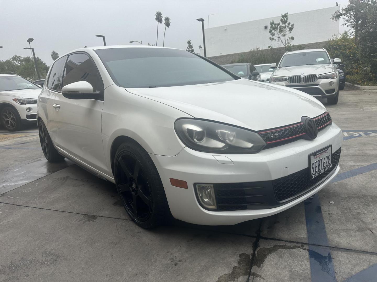 2010 White /Black Volkswagen GTI 2.0T Coupe PZEV (WVWFD7AJ9AW) with an 2.0L L4 DOHC 16V TURBO engine, Automatic transmission, located at 30 S. Berkeley Avenue, Pasadena, CA, 91107, (626) 248-7567, 34.145447, -118.109398 - Leather Seats! Moon-roof! This 2010 Volkswagen GTI 2.0T Coupe PZEV looks and drives well. This vehicle comes with a dealer 30 day / 1,000 Mile Warranty ( call us for details) and with Options up to 5 years / 100,000 Mile Warranty. Bad credit? We can help! We are the bank. Buy with confidence! All o - Photo#6