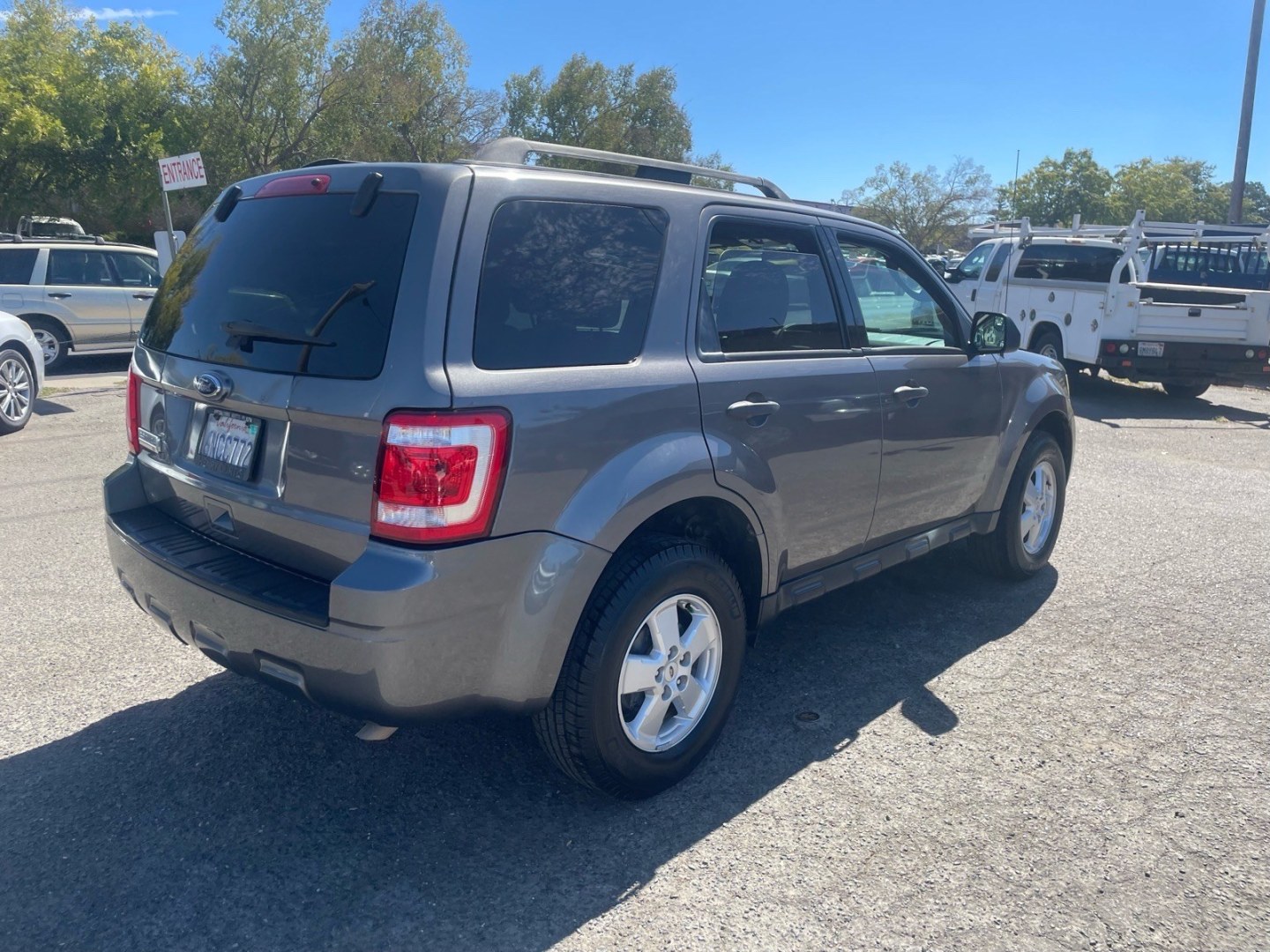 2010 Sterling Grey Metallic Ford Escape XLT (1FMCU0D74AK) with an 2.5L Duratec 2.5L I4 171hp 171ft. lbs. Sequential Multiport Fuel Injection engine, 6-Speed Automatic transmission, located at 800 Riverside Ave, Roseville, CA, 95678, 916-773-4549 & Toll Free: 866-719-4393, 38.732265, -121.291039 - XLT SERVICE RECORDS- Photo#3