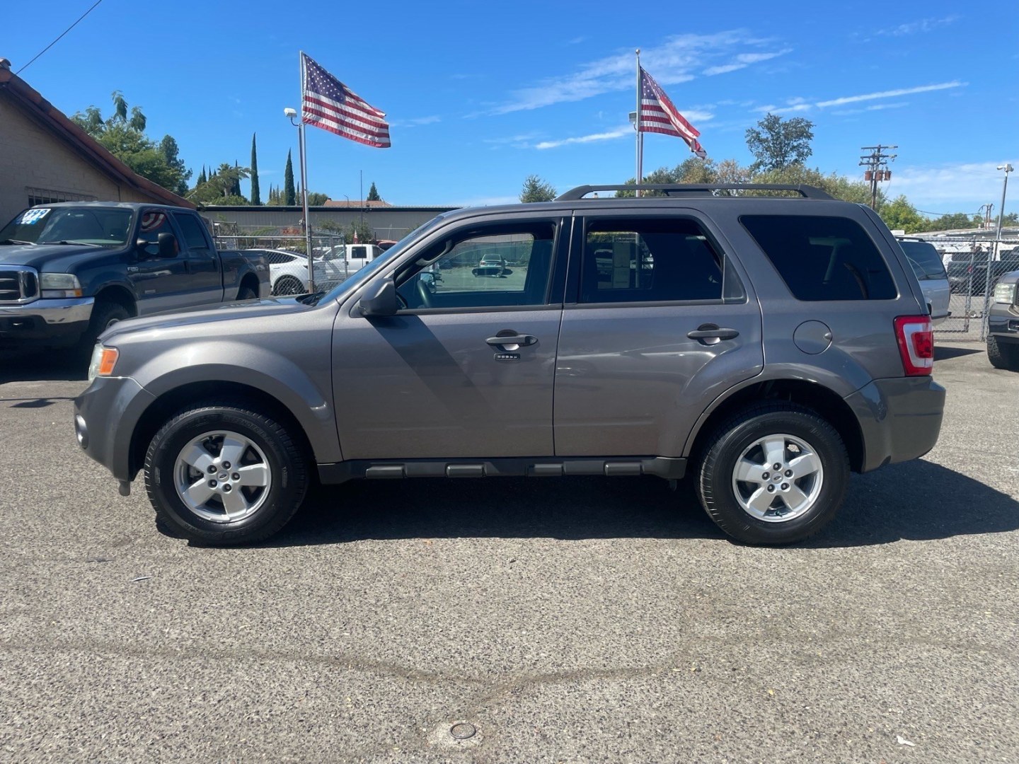 2010 Sterling Grey Metallic Ford Escape XLT (1FMCU0D74AK) with an 2.5L Duratec 2.5L I4 171hp 171ft. lbs. Sequential Multiport Fuel Injection engine, 6-Speed Automatic transmission, located at 800 Riverside Ave, Roseville, CA, 95678, 916-773-4549 & Toll Free: 866-719-4393, 38.732265, -121.291039 - XLT SERVICE RECORDS- Photo#4