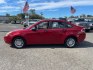 2010 Sangria Red Metallic Ford Focus SE (1FAHP3FN5AW) with an 2.0L 2.0L I4 140hp 136ft. lbs. Sequential Multiport Fuel Injection engine, 4-Speed Automatic transmission, located at 800 Riverside Ave, Roseville, CA, 95678, 916-773-4549 & Toll Free: 866-719-4393, 38.732265, -121.291039 - SE LOW MILES NEW TIRES CLEAN CARFAX- Photo#4