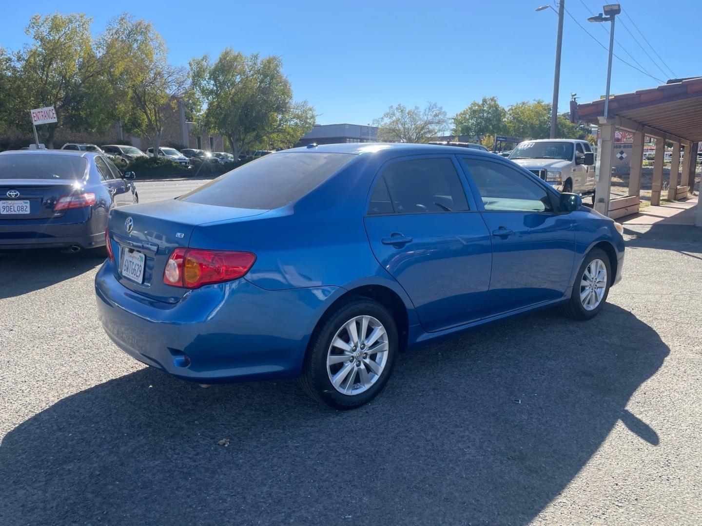 2010 Blue Streak Metallic Toyota Corolla LE (1NXBU4EE5AZ) with an 1.8L 1.8L I4 132hp 128ft. lbs. Sequential Multiport Fuel Injection engine, 4-Speed Automatic transmission, located at 800 Riverside Ave, Roseville, CA, 95678, 916-773-4549 & Toll Free: 866-719-4393, 38.732265, -121.291039- Photo#4