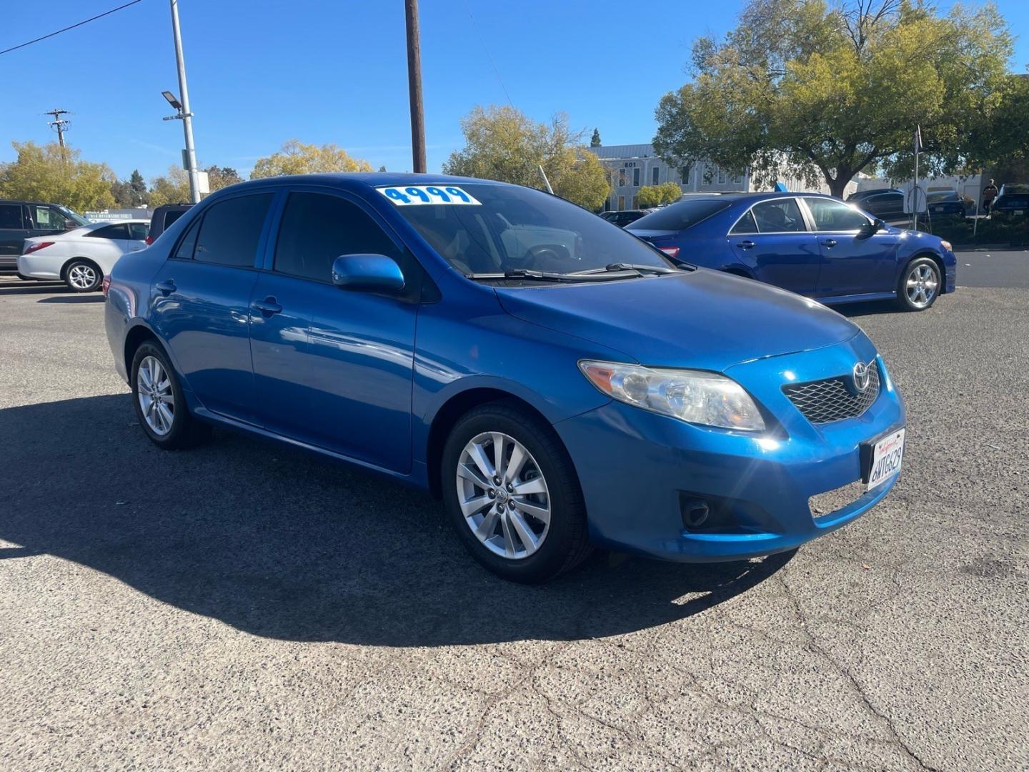 2010 Blue Streak Metallic Toyota Corolla LE (1NXBU4EE5AZ) with an 1.8L 1.8L I4 132hp 128ft. lbs. Sequential Multiport Fuel Injection engine, 4-Speed Automatic transmission, located at 800 Riverside Ave, Roseville, CA, 95678, 916-773-4549 & Toll Free: 866-719-4393, 38.732265, -121.291039- Photo#6