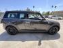 2011 Mineral Gray Metallic /Black Mini Clubman S (WMWZG3C51BT) with an 1.6L L4 DOHC 16V TURBO engine, Manual transmission, located at 30 S. Berkeley Avenue, Pasadena, CA, 91107, (626) 248-7567, 34.145447, -118.109398 - Ready to add a touch of fun and personality to your daily drive in Pasadena, CA? Check out this charming 2011 Mini Cooper Clubman, now available at Crown City Motors, located at 30 S Berkeley Ave, Pasadena, CA 91107. As a leading buy here pay here dealer, we’re excited to offer this quirky yet pra - Photo#7