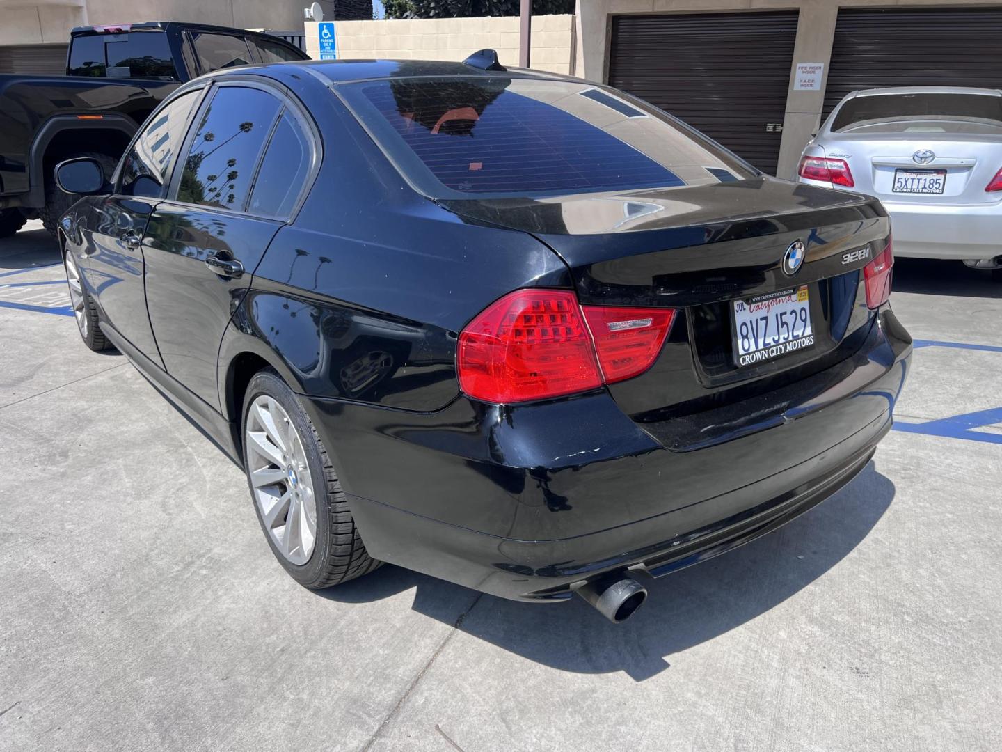 2011 Black /Black BMW 3-Series 328i Sedan 4D (WBAPH5G51BN) with an 6-Cyl, SULEV, 3.0L engine, Automatic, 6-Spd w/Overdrive transmission, located at 30 S. Berkeley Avenue, Pasadena, CA, 91107, (626) 248-7567, 34.145447, -118.109398 - 2011 BMW 328i – Buy Here Pay Here – $995 Down – Bad Credit OK – Crown City Motors Pasadena Take the wheel of luxury with the legendary 2011 BMW 328i Sedan, available now at Crown City Motors in Pasadena. With timeless European styling, a powerful 3.0L inline-6 engine, and the ultimate drivi - Photo#2