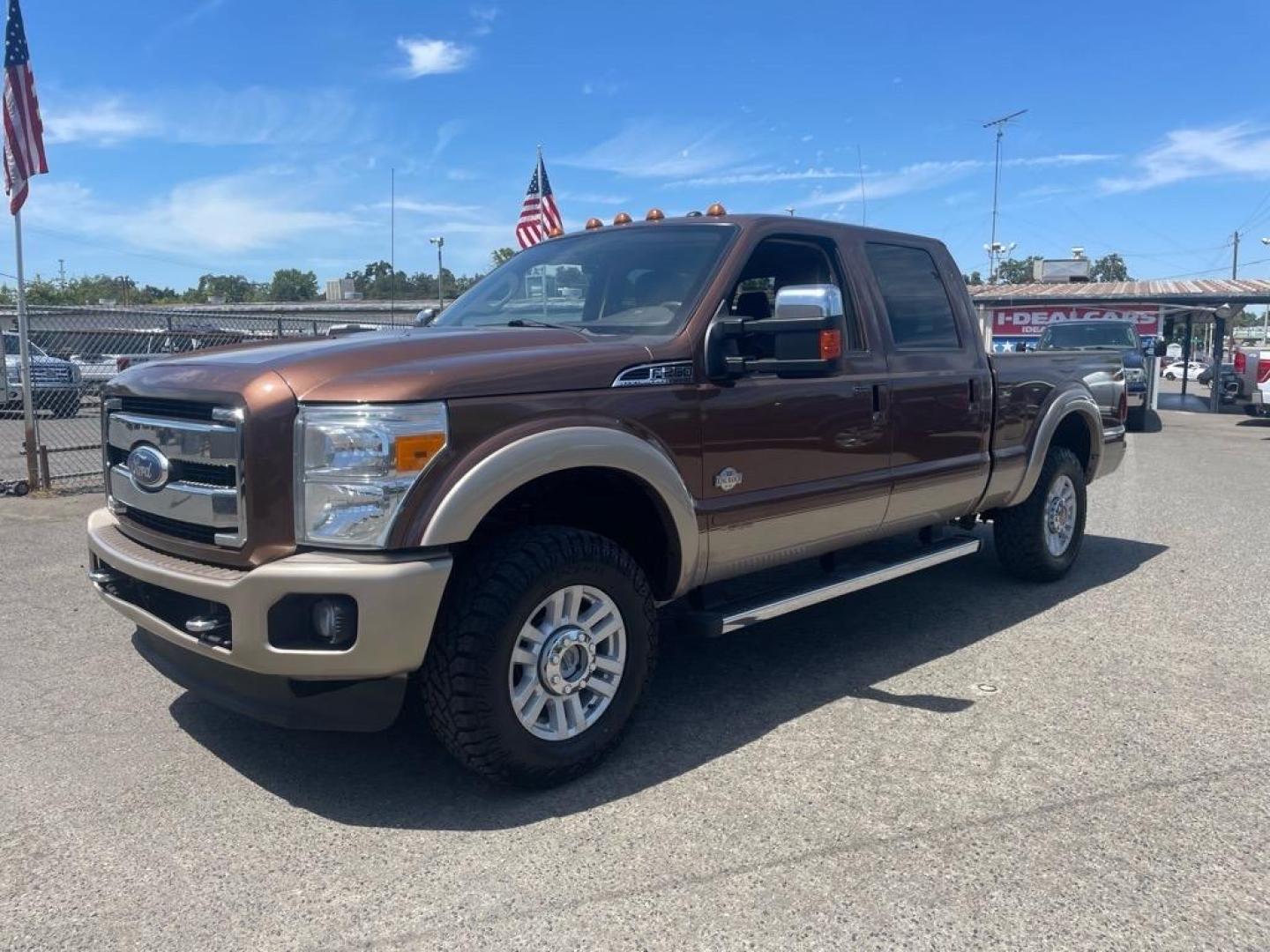 2011 Golden Bronze Metallic/Pale Adobe Metallic Ford F-250 Super Duty King Ranch (1FT7W2BTXBE) with an 6.7L Power Stroke 6.7L Biodiesel Turbo V8 400hp 800ft. lbs. Common Rail Direct Injection engine, 6-Speed Shiftable Automatic transmission, located at 800 Riverside Ave, Roseville, CA, 95678, 916-773-4549 & Toll Free: 866-719-4393, 38.732265, -121.291039 - DIESEL CREW CAB 4X4 FX4 KING RANCH SERVICE RECORDS ON CLEAN CARFAX - Photo#0