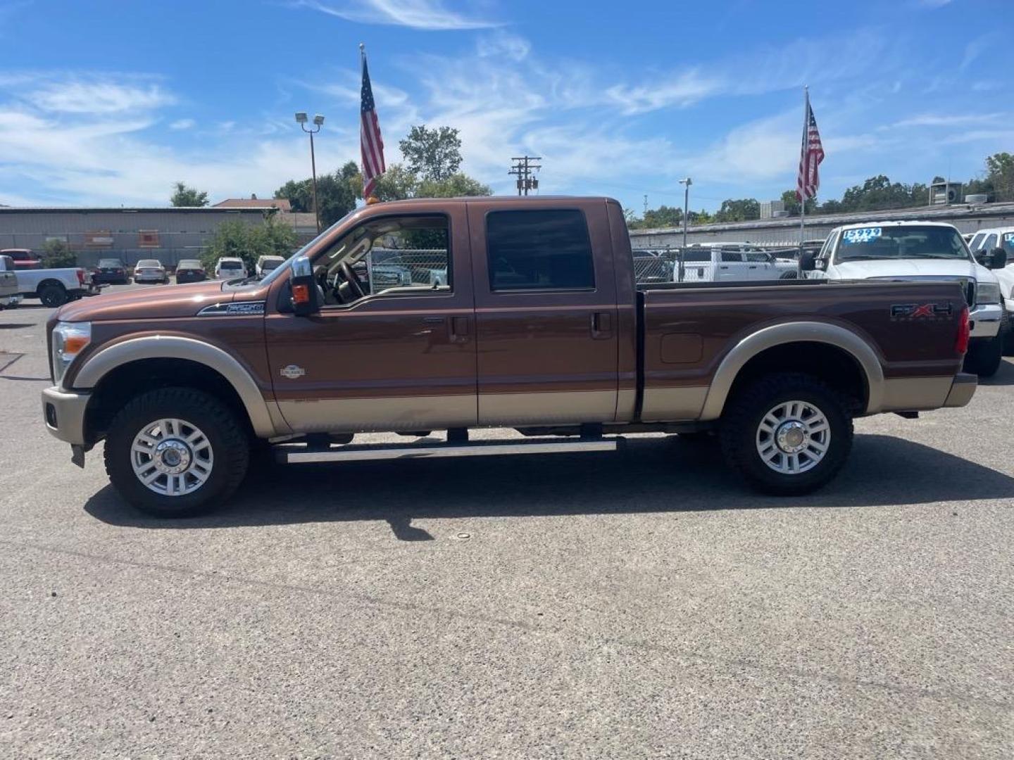 2011 Golden Bronze Metallic/Pale Adobe Metallic Ford F-250 Super Duty King Ranch (1FT7W2BTXBE) with an 6.7L Power Stroke 6.7L Biodiesel Turbo V8 400hp 800ft. lbs. Common Rail Direct Injection engine, 6-Speed Shiftable Automatic transmission, located at 800 Riverside Ave, Roseville, CA, 95678, 916-773-4549 & Toll Free: 866-719-4393, 38.732265, -121.291039 - DIESEL CREW CAB 4X4 FX4 KING RANCH SERVICE RECORDS ON CLEAN CARFAX - Photo#4