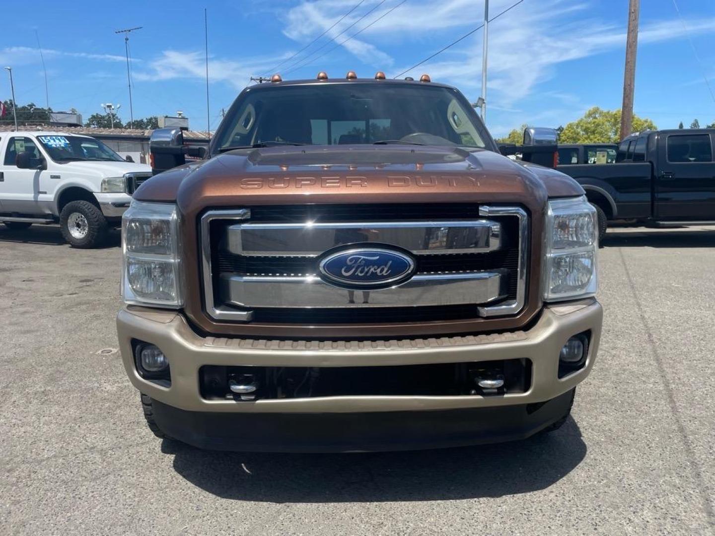 2011 Golden Bronze Metallic/Pale Adobe Metallic Ford F-250 Super Duty King Ranch (1FT7W2BTXBE) with an 6.7L Power Stroke 6.7L Biodiesel Turbo V8 400hp 800ft. lbs. Common Rail Direct Injection engine, 6-Speed Shiftable Automatic transmission, located at 800 Riverside Ave, Roseville, CA, 95678, 916-773-4549 & Toll Free: 866-719-4393, 38.732265, -121.291039 - DIESEL CREW CAB 4X4 FX4 KING RANCH SERVICE RECORDS ON CLEAN CARFAX - Photo#7