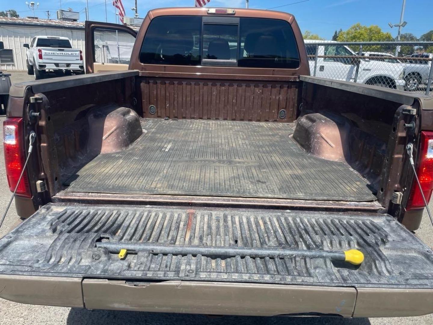 2011 Golden Bronze Metallic/Pale Adobe Metallic Ford F-250 Super Duty King Ranch (1FT7W2BTXBE) with an 6.7L Power Stroke 6.7L Biodiesel Turbo V8 400hp 800ft. lbs. Common Rail Direct Injection engine, 6-Speed Shiftable Automatic transmission, located at 800 Riverside Ave, Roseville, CA, 95678, 916-773-4549 & Toll Free: 866-719-4393, 38.732265, -121.291039 - DIESEL CREW CAB 4X4 FX4 KING RANCH SERVICE RECORDS ON CLEAN CARFAX - Photo#9