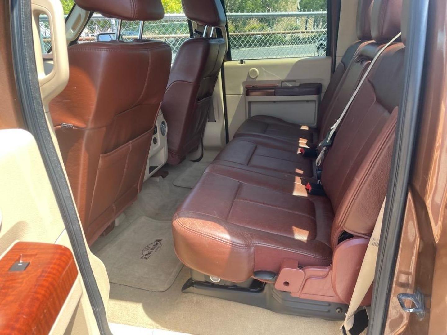 2011 Golden Bronze Metallic/Pale Adobe Metallic Ford F-250 Super Duty King Ranch (1FT7W2BTXBE) with an 6.7L Power Stroke 6.7L Biodiesel Turbo V8 400hp 800ft. lbs. Common Rail Direct Injection engine, 6-Speed Shiftable Automatic transmission, located at 800 Riverside Ave, Roseville, CA, 95678, 916-773-4549 & Toll Free: 866-719-4393, 38.732265, -121.291039 - DIESEL CREW CAB 4X4 FX4 KING RANCH SERVICE RECORDS ON CLEAN CARFAX - Photo#11
