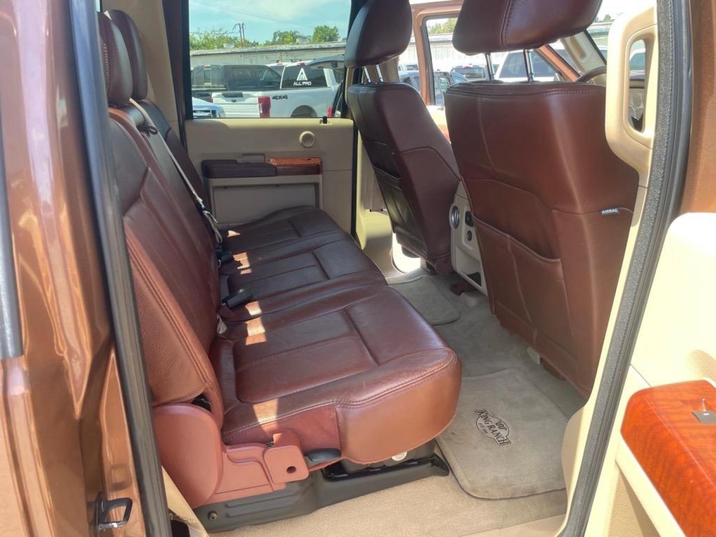 2011 Golden Bronze Metallic/Pale Adobe Metallic Ford F-250 Super Duty King Ranch (1FT7W2BTXBE) with an 6.7L Power Stroke 6.7L Biodiesel Turbo V8 400hp 800ft. lbs. Common Rail Direct Injection engine, 6-Speed Shiftable Automatic transmission, located at 800 Riverside Ave, Roseville, CA, 95678, 916-773-4549 & Toll Free: 866-719-4393, 38.732265, -121.291039 - DIESEL CREW CAB 4X4 FX4 KING RANCH SERVICE RECORDS ON CLEAN CARFAX - Photo#13