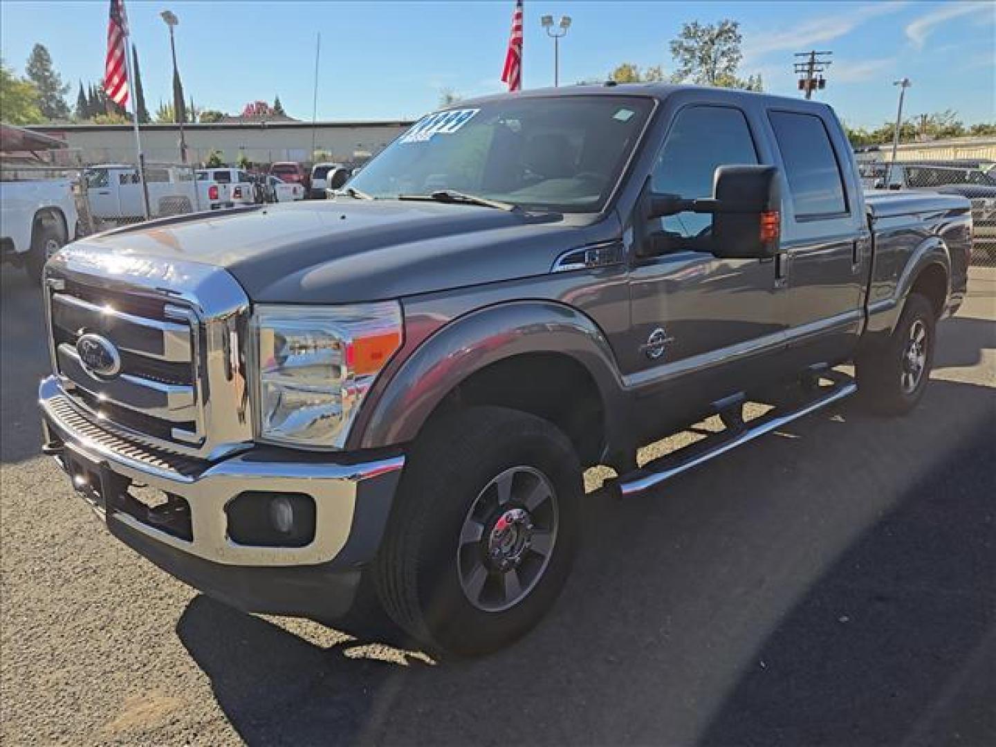 2011 Sterling Grey Metallic Ford F-250 Super Duty Lariat (1FT7W29F1BE) with an 6.7L Power Stroke 6.7L Biodiesel Turbo V8 400hp 800ft. lbs. Common Rail Direct Injection engine, 6-Speed Shiftable Automatic transmission, located at 800 Riverside Ave, Roseville, CA, 95678, 916-773-4549 & Toll Free: 866-719-4393, 38.732265, -121.291039 - DIESEL CREW CAB 4X4 FX4 LOW MILES 1 OWNER - Photo#1