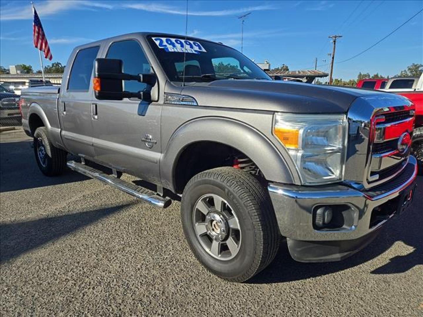 2011 Sterling Grey Metallic Ford F-250 Super Duty Lariat (1FT7W29F1BE) with an 6.7L Power Stroke 6.7L Biodiesel Turbo V8 400hp 800ft. lbs. Common Rail Direct Injection engine, 6-Speed Shiftable Automatic transmission, located at 800 Riverside Ave, Roseville, CA, 95678, 916-773-4549 & Toll Free: 866-719-4393, 38.732265, -121.291039 - DIESEL CREW CAB 4X4 FX4 LOW MILES 1 OWNER - Photo#2