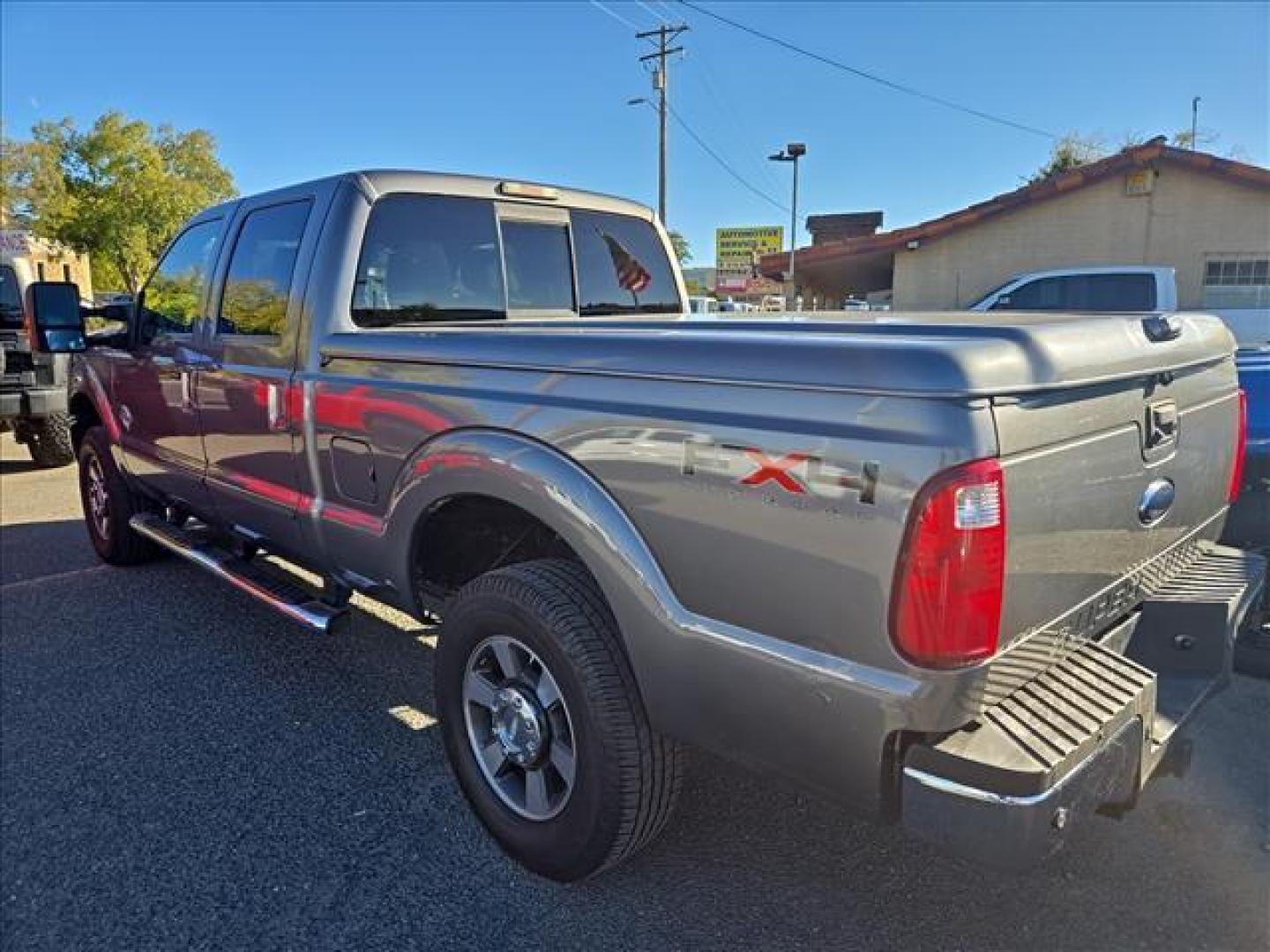 2011 Sterling Grey Metallic Ford F-250 Super Duty Lariat (1FT7W29F1BE) with an 6.7L Power Stroke 6.7L Biodiesel Turbo V8 400hp 800ft. lbs. Common Rail Direct Injection engine, 6-Speed Shiftable Automatic transmission, located at 800 Riverside Ave, Roseville, CA, 95678, 916-773-4549 & Toll Free: 866-719-4393, 38.732265, -121.291039 - DIESEL CREW CAB 4X4 FX4 LOW MILES 1 OWNER - Photo#3