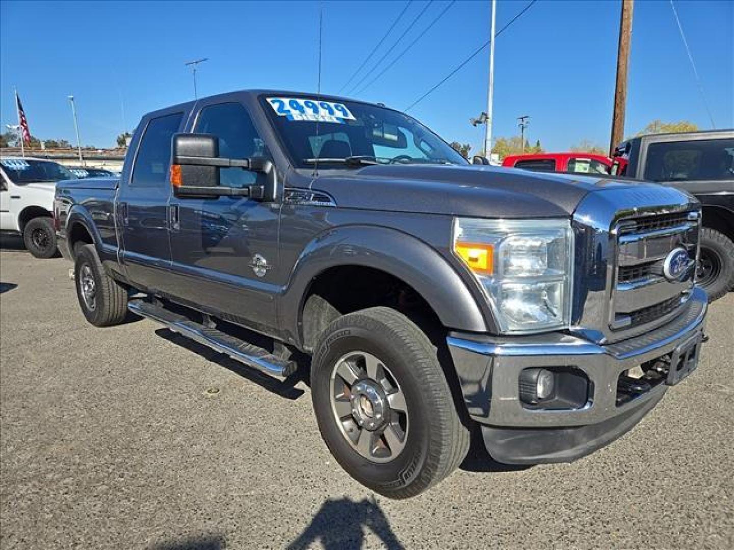 2011 Sterling Grey Metallic Ford F-250 Super Duty Lariat (1FT7W2BT1BE) with an 6.7L Power Stroke 6.7L Biodiesel Turbo V8 400hp 800ft. lbs. Common Rail Direct Injection engine, 6-Speed Shiftable Automatic transmission, located at 800 Riverside Ave, Roseville, CA, 95678, 916-773-4549 & Toll Free: 866-719-4393, 38.732265, -121.291039 - DIESEL CREW CAB 4X4 FX4 LARIAT ONE OWNER LOW MILES - Photo#1