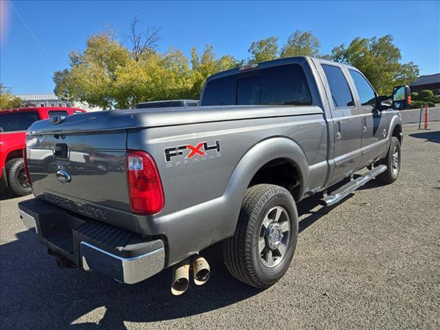 2011 Sterling Grey Metallic Ford F-250 Super Duty Lariat (1FT7W2BT1BE) with an 6.7L Power Stroke 6.7L Biodiesel Turbo V8 400hp 800ft. lbs. Common Rail Direct Injection engine, 6-Speed Shiftable Automatic transmission, located at 800 Riverside Ave, Roseville, CA, 95678, 916-773-4549 & Toll Free: 866-719-4393, 38.732265, -121.291039 - DIESEL CREW CAB 4X4 FX4 LARIAT ONE OWNER LOW MILES - Photo#3