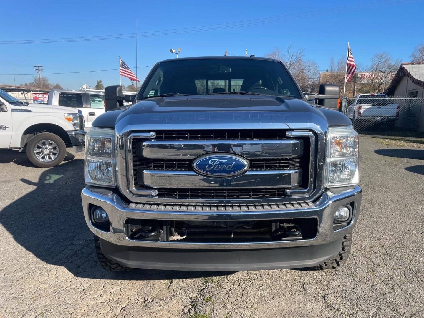 2011 Sterling Grey Metallic Ford F-250 Super Duty Lariat (1FT7W2BT3BE) with an 6.7L Power Stroke 6.7L Biodiesel Turbo V8 400hp 800ft. lbs. Common Rail Direct Injection engine, 6-Speed Shiftable Automatic transmission, located at 800 Riverside Ave, Roseville, CA, 95678, 916-773-4549 & Toll Free: 866-719-4393, 38.732265, -121.291039 - DIESEL CREW CAB 4X4 FX4 NEW TIRES SERVICE RECORDS - Photo#6