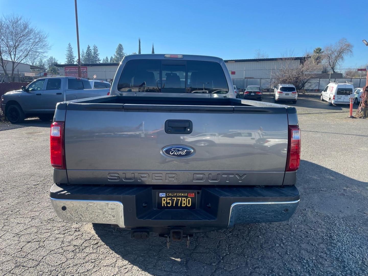 2011 Sterling Grey Metallic Ford F-250 Super Duty Lariat (1FT7W2BT3BE) with an 6.7L Power Stroke 6.7L Biodiesel Turbo V8 400hp 800ft. lbs. Common Rail Direct Injection engine, 6-Speed Shiftable Automatic transmission, located at 800 Riverside Ave, Roseville, CA, 95678, 916-773-4549 & Toll Free: 866-719-4393, 38.732265, -121.291039 - DIESEL CREW CAB 4X4 FX4 NEW TIRES SERVICE RECORDS - Photo#7