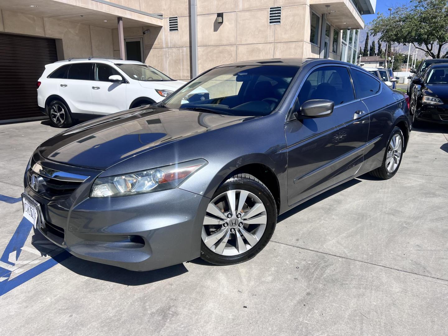 2011 Gray metallic /BLACK Honda Accord Cpe EX Coupe AT (1HGCS1B75BA) with an 2.4L L4 DOHC 16V engine, 5-Speed Automatic transmission, located at 30 S. Berkeley Avenue, Pasadena, CA, 91107, (626) 248-7567, 34.145447, -118.109398 - Moon Roof! New Tires! Nice Interior! Looks and Drives Good! Bad credit? We can help! We are the bank. All our cars are thoroughly inspected and reconditioned by our technicians. FREE CARFAX report. Stop by or call to speak with our friendly staff. Whether you have bad credit, no credit, bankruptcy - Photo#0
