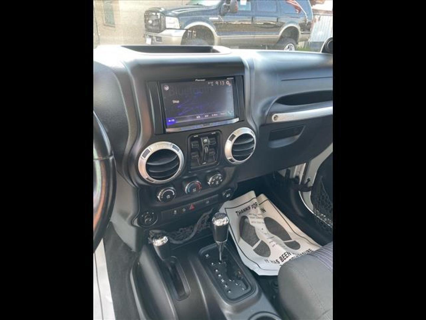 2011 Bright Silver Metallic Clear Coat Jeep Wrangler Unlimited Rubicon (1J4BA6H18BL) with an 3.8L 3.8L V6 202hp 237ft. lbs. Sequential Multiport Fuel Injection engine, 4-Speed Automatic transmission, located at 800 Riverside Ave, Roseville, CA, 95678, 916-773-4549 & Toll Free: 866-719-4393, 38.732265, -121.291039 - 4X4 UNLIMITED RUBICON HARD TOP - Photo#11