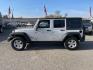 2011 Bright Silver Metallic Clear Coat Jeep Wrangler Unlimited Rubicon (1J4BA6H18BL) with an 3.8L 3.8L V6 202hp 237ft. lbs. Sequential Multiport Fuel Injection engine, 4-Speed Automatic transmission, located at 800 Riverside Ave, Roseville, CA, 95678, 916-773-4549 & Toll Free: 866-719-4393, 38.732265, -121.291039 - 4X4 UNLIMITED RUBICON HARD TOP - Photo#5
