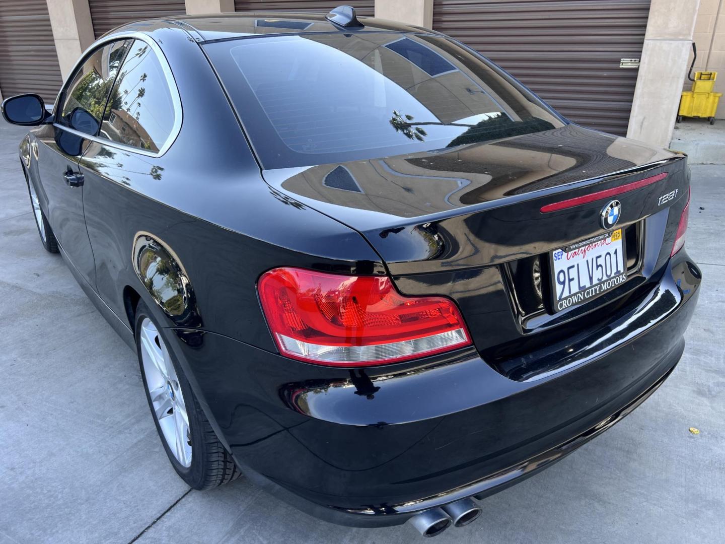 2012 BLACK /Black BMW 1-Series 128i Coupe (WBAUP9C59CV) with an 3.0L L6 DOHC 24V engine, Automatic transmission, located at 30 S. Berkeley Avenue, Pasadena, CA, 91107, (626) 248-7567, 34.145447, -118.109398 - Discover the sleek and stylish 2012 BMW 128 at Crown City Motors, located at 30 S Berkeley Ave, Pasadena, CA 91107. As a premier buy here pay here dealer in Pasadena, we’re proud to offer this luxury compact coupe with low mileage and top-tier performance. The 2012 BMW 128 combines a powerful engi - Photo#2