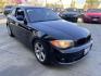 2012 BLACK /Black BMW 1-Series 128i Coupe (WBAUP9C59CV) with an 3.0L L6 DOHC 24V engine, Automatic transmission, located at 30 S. Berkeley Avenue, Pasadena, CA, 91107, (626) 248-7567, 34.145447, -118.109398 - Discover the sleek and stylish 2012 BMW 128 at Crown City Motors, located at 30 S Berkeley Ave, Pasadena, CA 91107. As a premier buy here pay here dealer in Pasadena, we’re proud to offer this luxury compact coupe with low mileage and top-tier performance. The 2012 BMW 128 combines a powerful engi - Photo#4