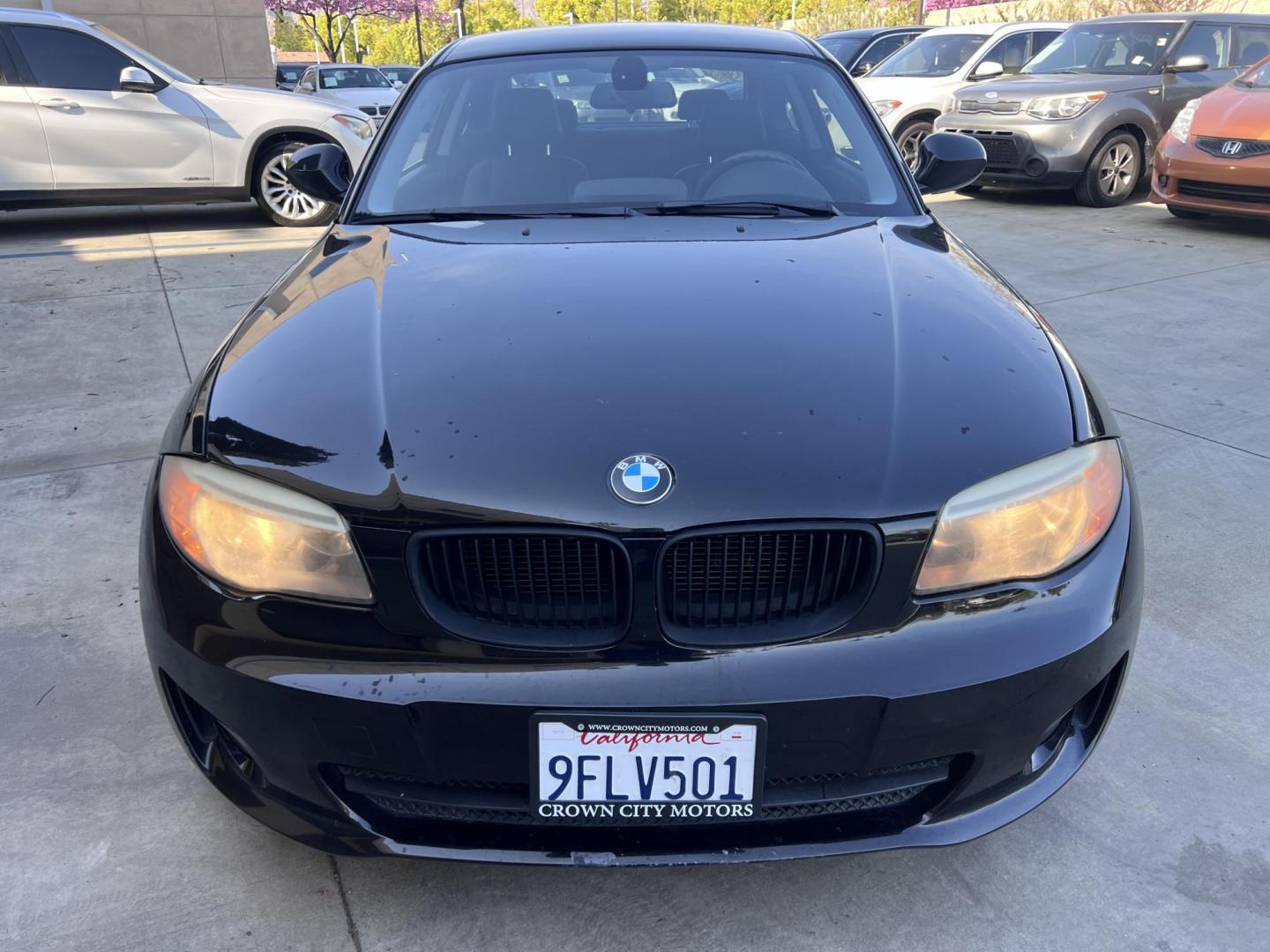 2012 BLACK /Black BMW 1-Series 128i Coupe (WBAUP9C59CV) with an 3.0L L6 DOHC 24V engine, Automatic transmission, located at 30 S. Berkeley Avenue, Pasadena, CA, 91107, (626) 248-7567, 34.145447, -118.109398 - Discover the sleek and stylish 2012 BMW 128 at Crown City Motors, located at 30 S Berkeley Ave, Pasadena, CA 91107. As a premier buy here pay here dealer in Pasadena, we’re proud to offer this luxury compact coupe with low mileage and top-tier performance. The 2012 BMW 128 combines a powerful engi - Photo#5