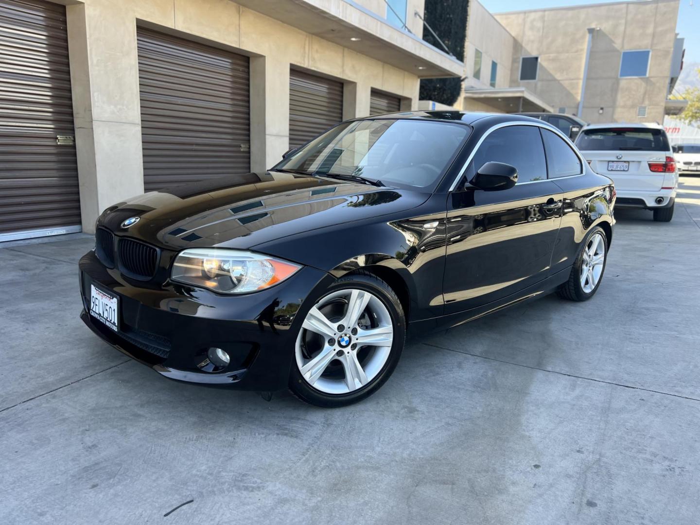 2012 BLACK /Black BMW 1-Series 128i Coupe (WBAUP9C59CV) with an 3.0L L6 DOHC 24V engine, Automatic transmission, located at 30 S. Berkeley Avenue, Pasadena, CA, 91107, (626) 248-7567, 34.145447, -118.109398 - Discover the sleek and stylish 2012 BMW 128 at Crown City Motors, located at 30 S Berkeley Ave, Pasadena, CA 91107. As a premier buy here pay here dealer in Pasadena, we’re proud to offer this luxury compact coupe with low mileage and top-tier performance. The 2012 BMW 128 combines a powerful engi - Photo#10