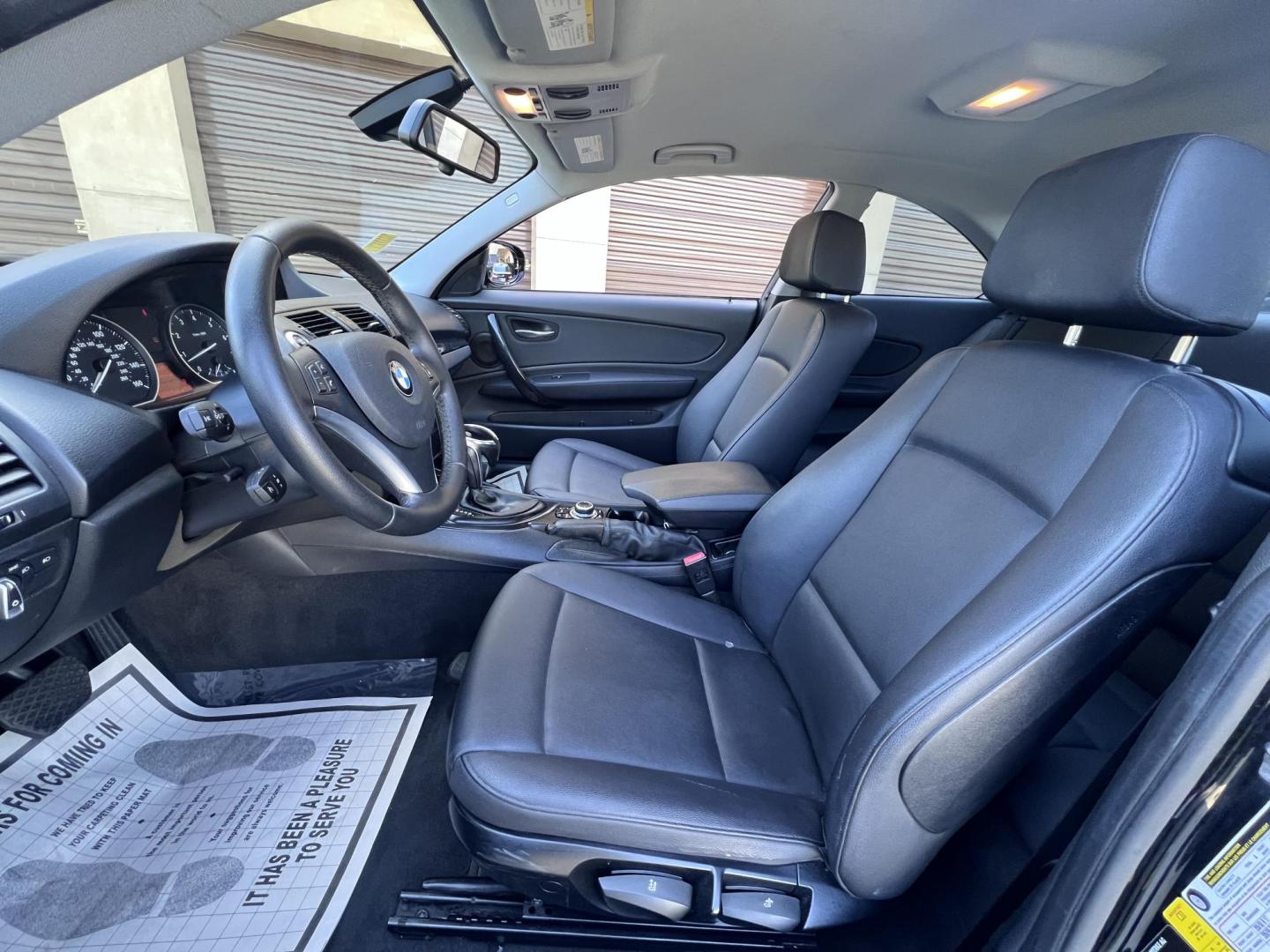 2012 BLACK /Black BMW 1-Series 128i Coupe (WBAUP9C59CV) with an 3.0L L6 DOHC 24V engine, Automatic transmission, located at 30 S. Berkeley Avenue, Pasadena, CA, 91107, (626) 248-7567, 34.145447, -118.109398 - Discover the sleek and stylish 2012 BMW 128 at Crown City Motors, located at 30 S Berkeley Ave, Pasadena, CA 91107. As a premier buy here pay here dealer in Pasadena, we’re proud to offer this luxury compact coupe with low mileage and top-tier performance. The 2012 BMW 128 combines a powerful engi - Photo#22