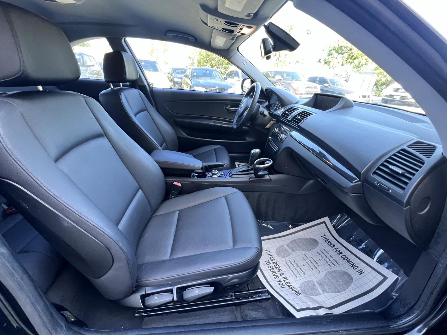 2012 BLACK /Black BMW 1-Series 128i Coupe (WBAUP9C59CV) with an 3.0L L6 DOHC 24V engine, Automatic transmission, located at 30 S. Berkeley Avenue, Pasadena, CA, 91107, (626) 248-7567, 34.145447, -118.109398 - Discover the sleek and stylish 2012 BMW 128 at Crown City Motors, located at 30 S Berkeley Ave, Pasadena, CA 91107. As a premier buy here pay here dealer in Pasadena, we’re proud to offer this luxury compact coupe with low mileage and top-tier performance. The 2012 BMW 128 combines a powerful engi - Photo#27
