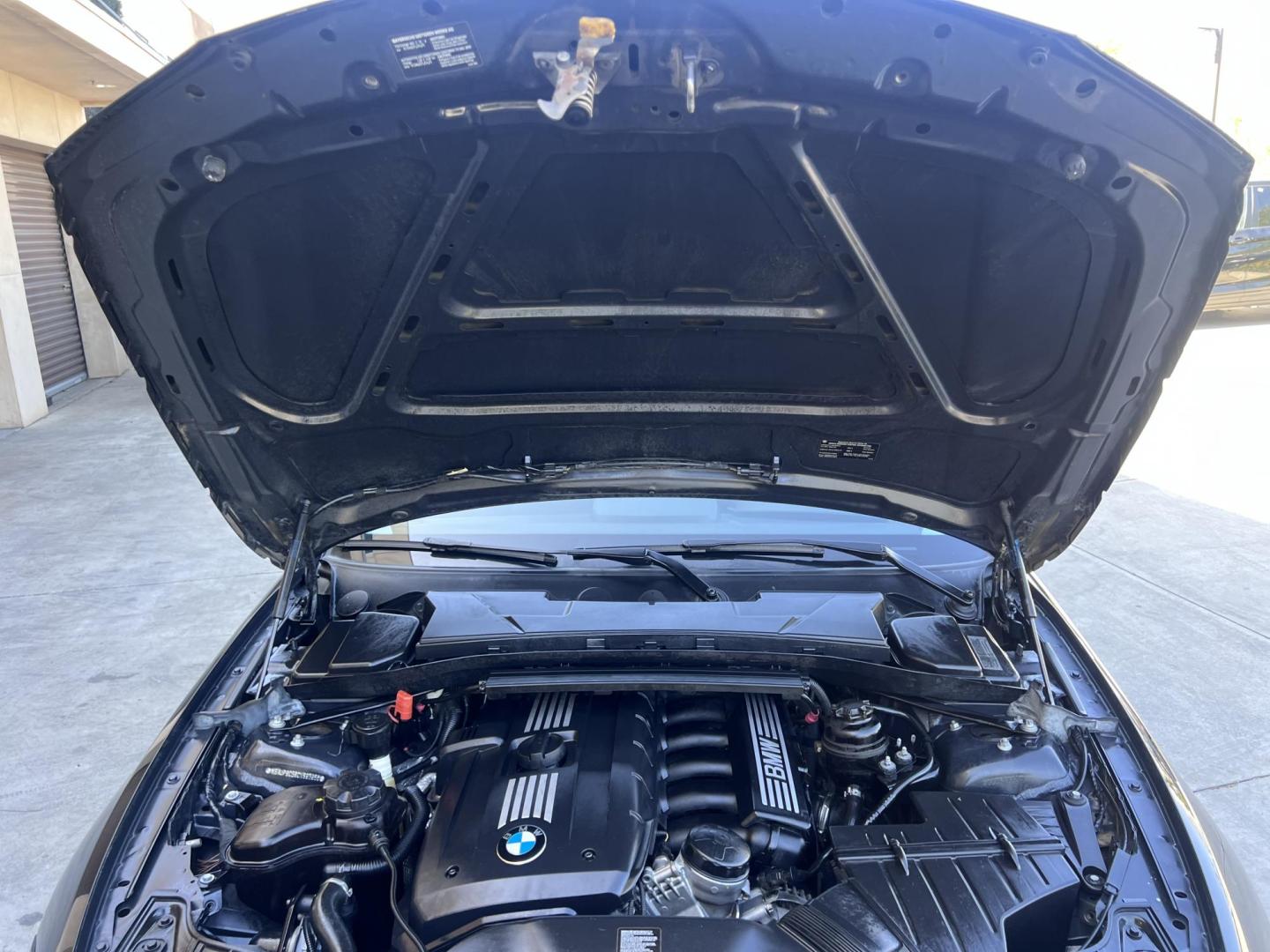 2012 BLACK /Black BMW 1-Series 128i Coupe (WBAUP9C59CV) with an 3.0L L6 DOHC 24V engine, Automatic transmission, located at 30 S. Berkeley Avenue, Pasadena, CA, 91107, (626) 248-7567, 34.145447, -118.109398 - Discover the sleek and stylish 2012 BMW 128 at Crown City Motors, located at 30 S Berkeley Ave, Pasadena, CA 91107. As a premier buy here pay here dealer in Pasadena, we’re proud to offer this luxury compact coupe with low mileage and top-tier performance. The 2012 BMW 128 combines a powerful engi - Photo#44