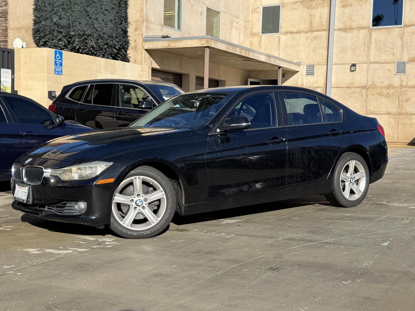 2012 BLACK /Black BMW 3-Series 328i Sedan (WBA3C1C51CF) with an 2.0L L4 DOHC 16V engine, located at 30 S. Berkeley Avenue, Pasadena, CA, 91107, (626) 248-7567, 34.145447, -118.109398 - This BMW 3 Series sedan offers the perfect blend of performance, comfort, and everyday usability. With only 82,000 miles, it has significantly lower mileage than average for its year, making it a smart option for buyers who want a well-maintained luxury vehicle. Highlights commonly associated wit - Photo#0
