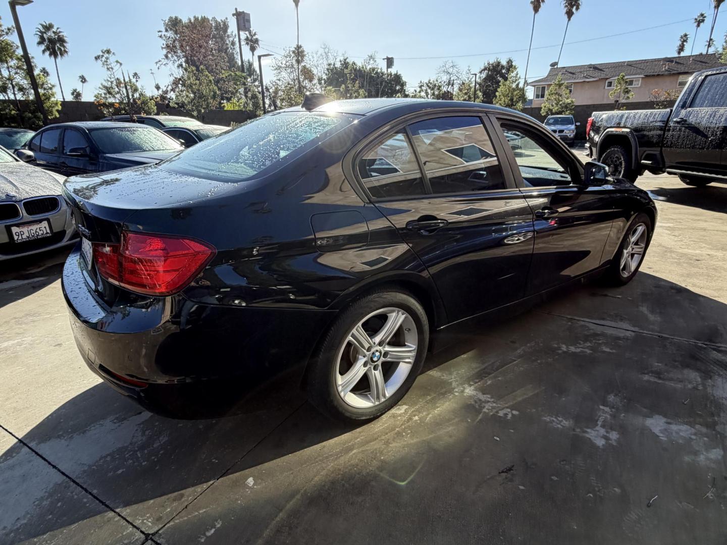 2012 BLACK /Black BMW 3-Series 328i Sedan (WBA3C1C51CF) with an 2.0L L4 DOHC 16V engine, located at 30 S. Berkeley Avenue, Pasadena, CA, 91107, (626) 248-7567, 34.145447, -118.109398 - This BMW 3 Series sedan offers the perfect blend of performance, comfort, and everyday usability. With only 82,000 miles, it has significantly lower mileage than average for its year, making it a smart option for buyers who want a well-maintained luxury vehicle. Highlights commonly associated wit - Photo#3
